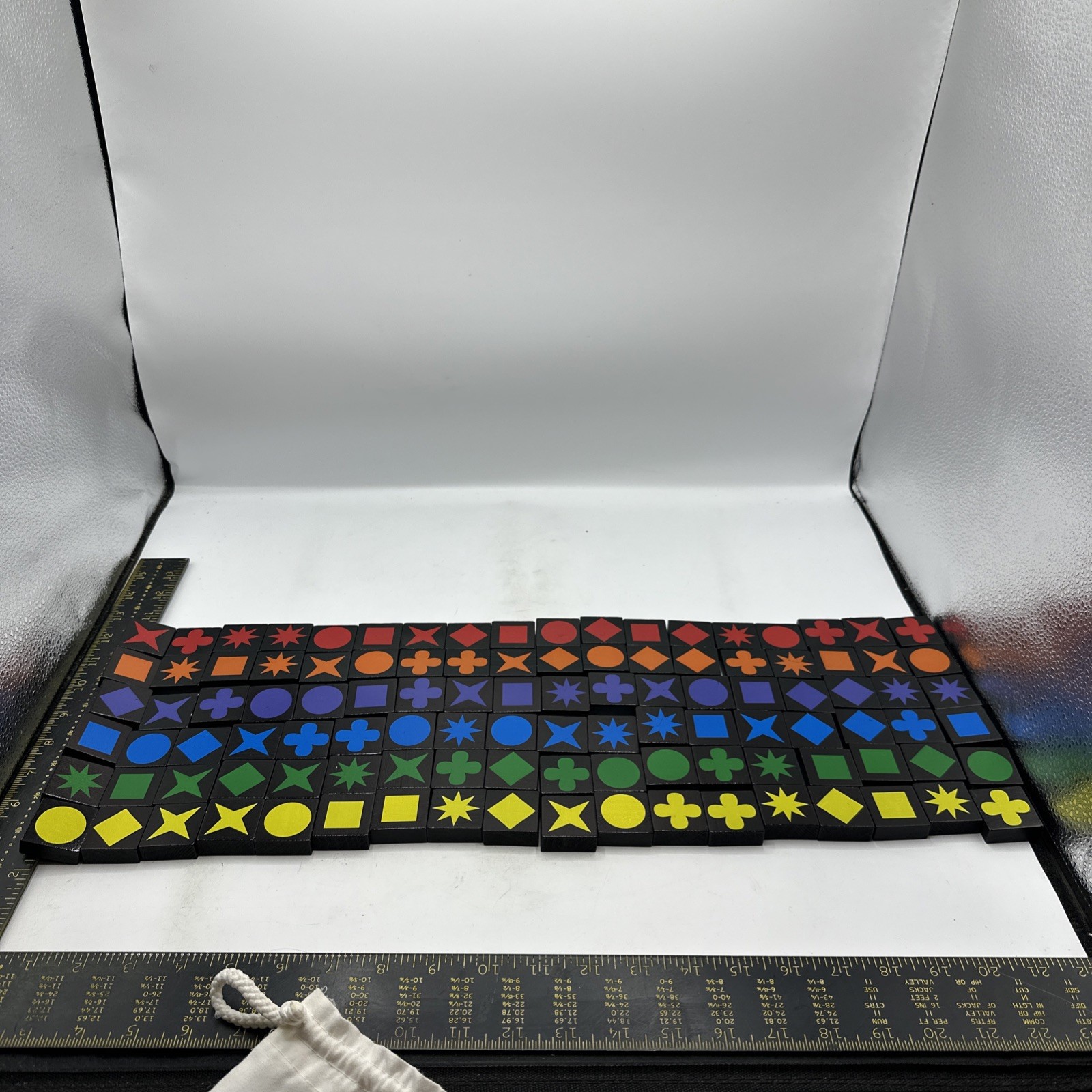 QWIRKLE – Mix, Match, Score and Wiin! 2-4 players, ages 6 and up. Complete 2010
