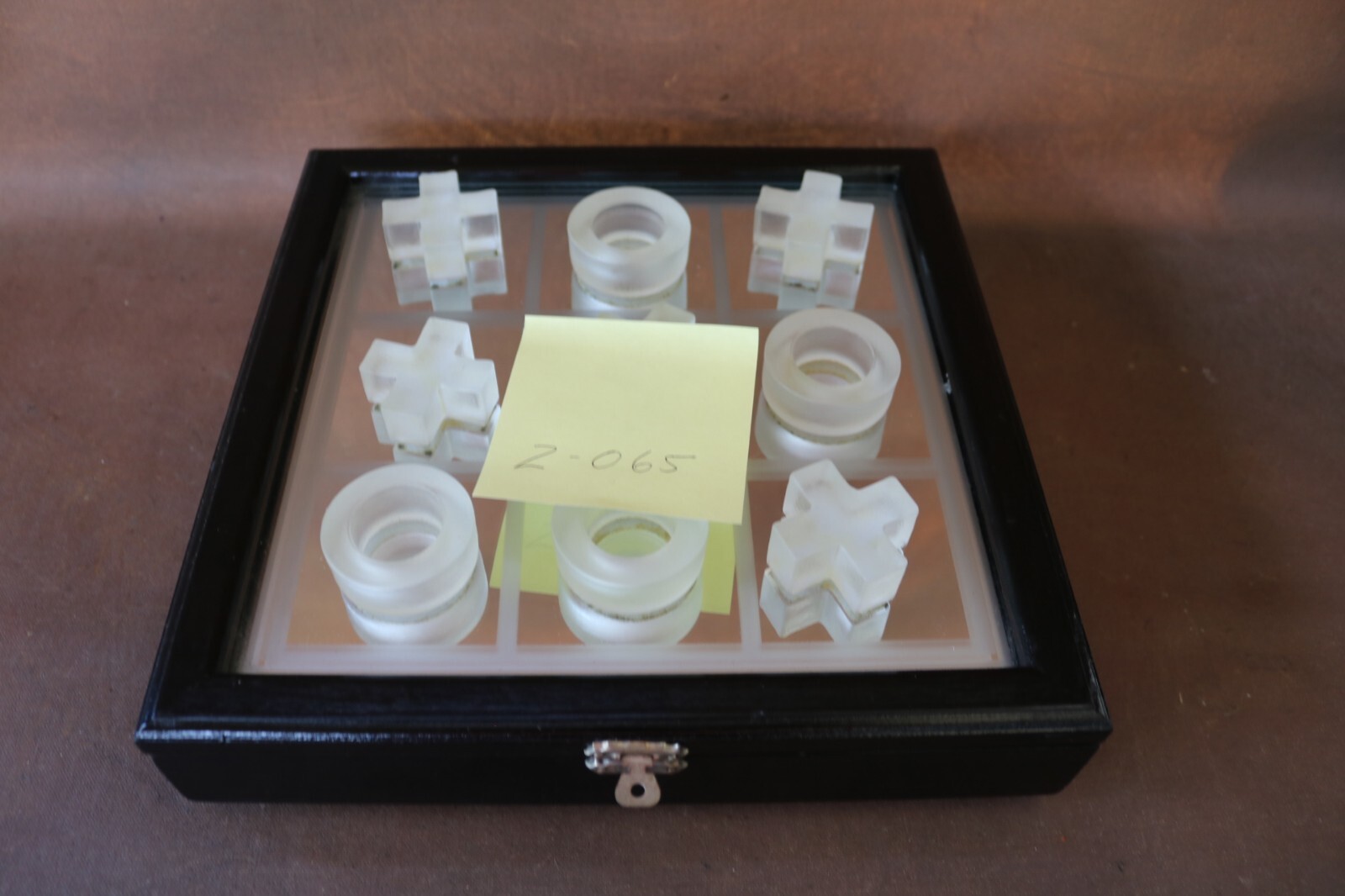 Tic-Tac-Toe Board Game featuring acrylic tokens with a storage mirrored board