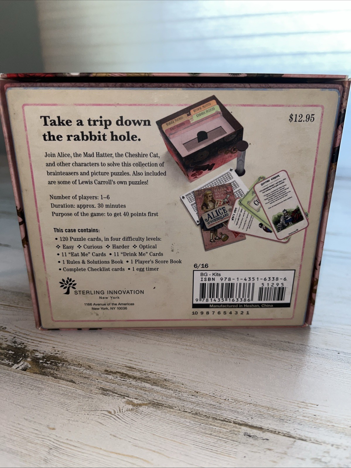 Sterling Innovation Alice in Wonderland Collection of Puzzles Trivia Game Open