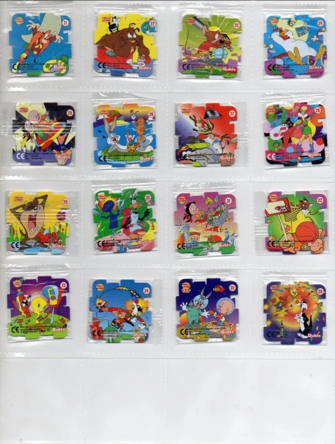 Walkers Looney Tunes Qubix Tazos – Complete set of 36 Tazos – year 2000 Sealed