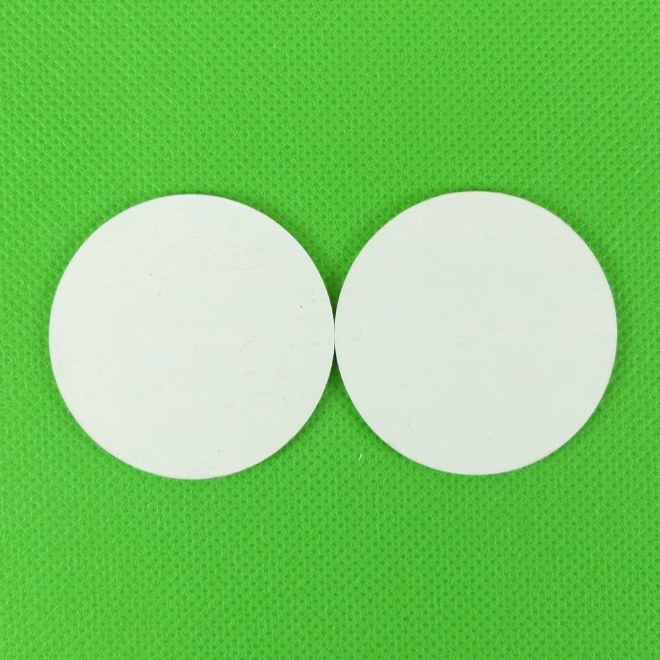 2 Pogs of CAT Pacific Machinery Theo. H. Davies. & CO., LTD. from early 1990s