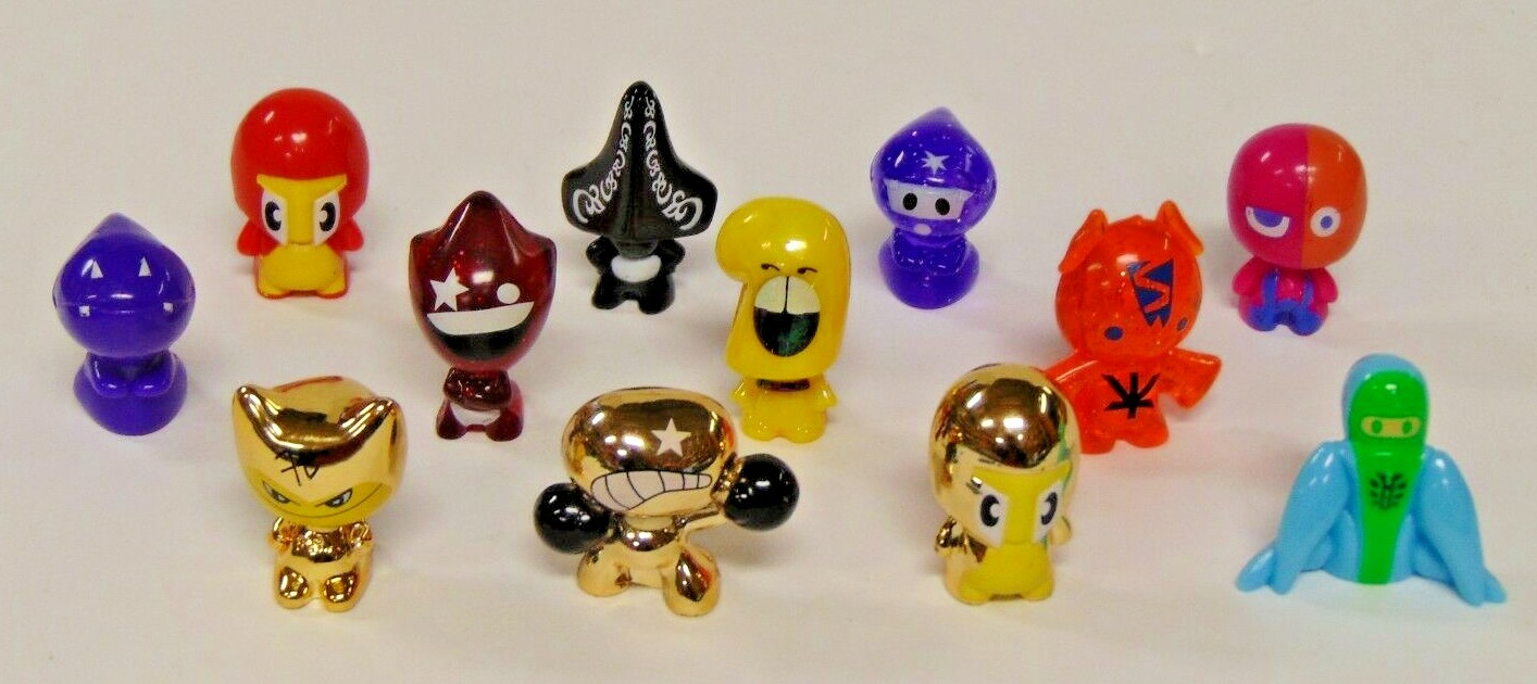 Gogo’s Crazy Bones Lot of 12 with gold bone and Green Cloth Bag pouch