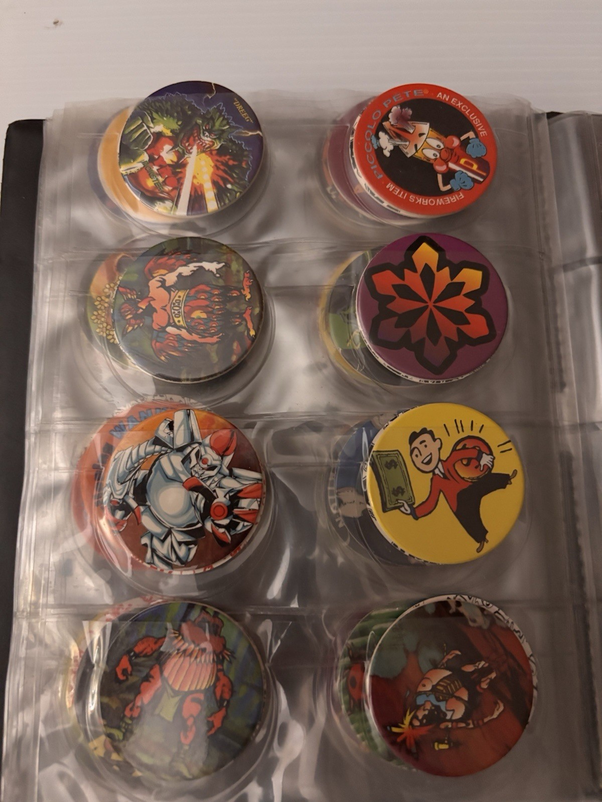 8 Page Pog Cap Album With 118 Pogs