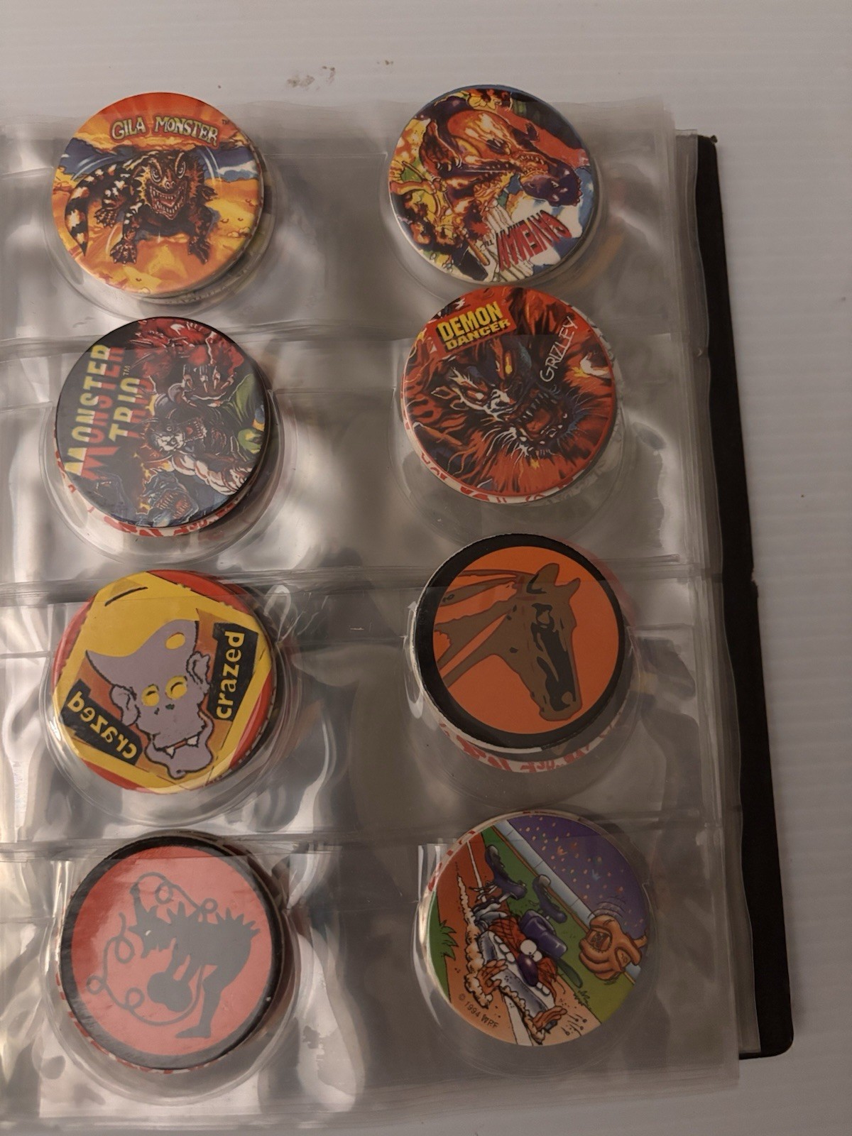 8 Page Pog Cap Album With 118 Pogs