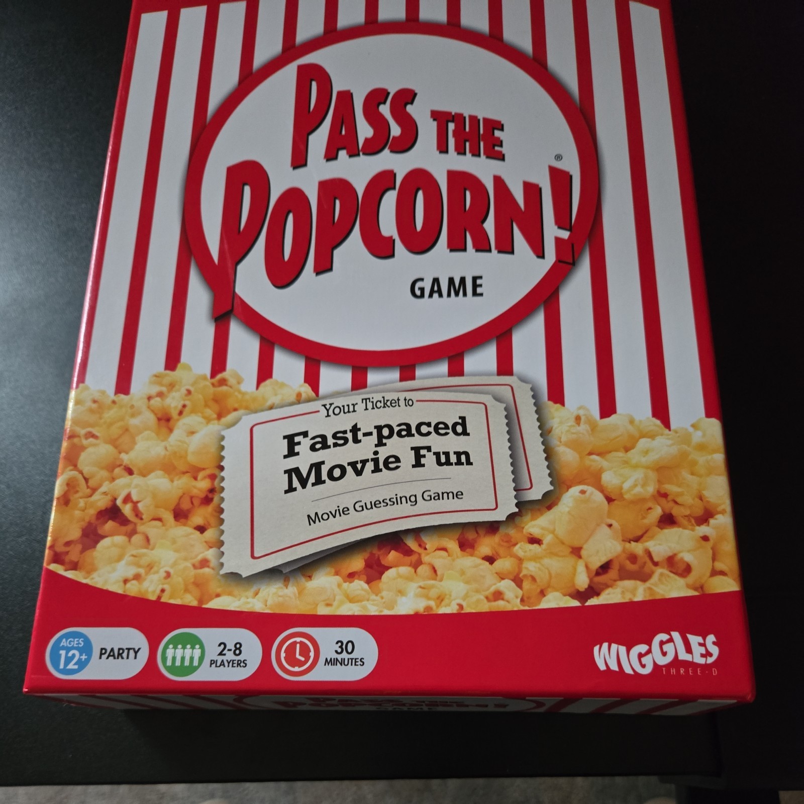 Pass the Popcorn Trivia game. New and complete . Open box.