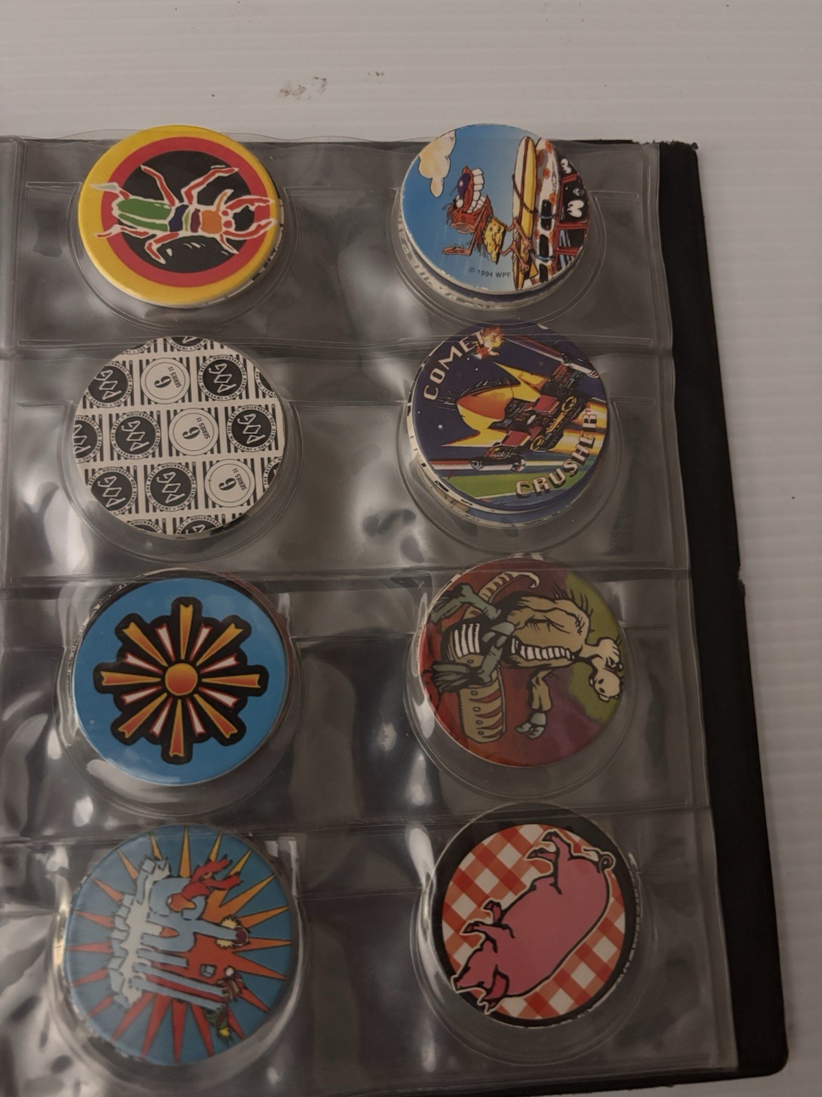 8 Page Pog Cap Album With 118 Pogs