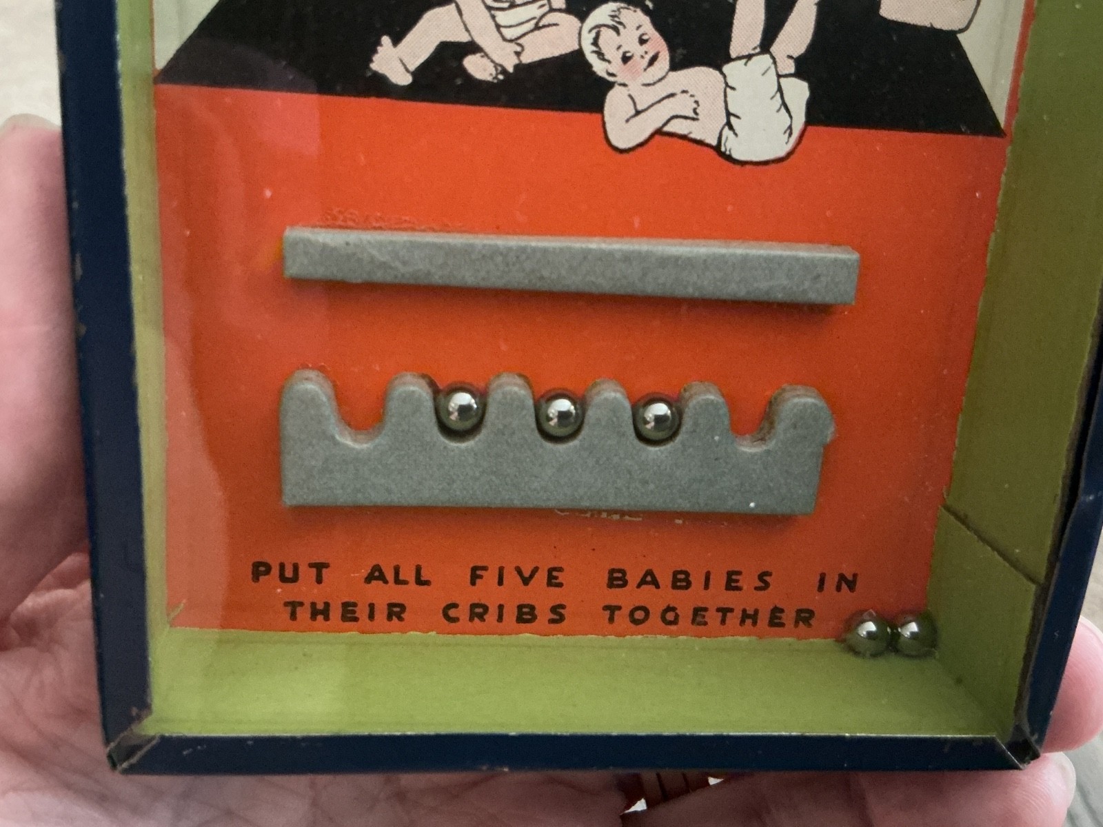 Vintage handheld dexterity game-Quintuplets-The Five Babies Game