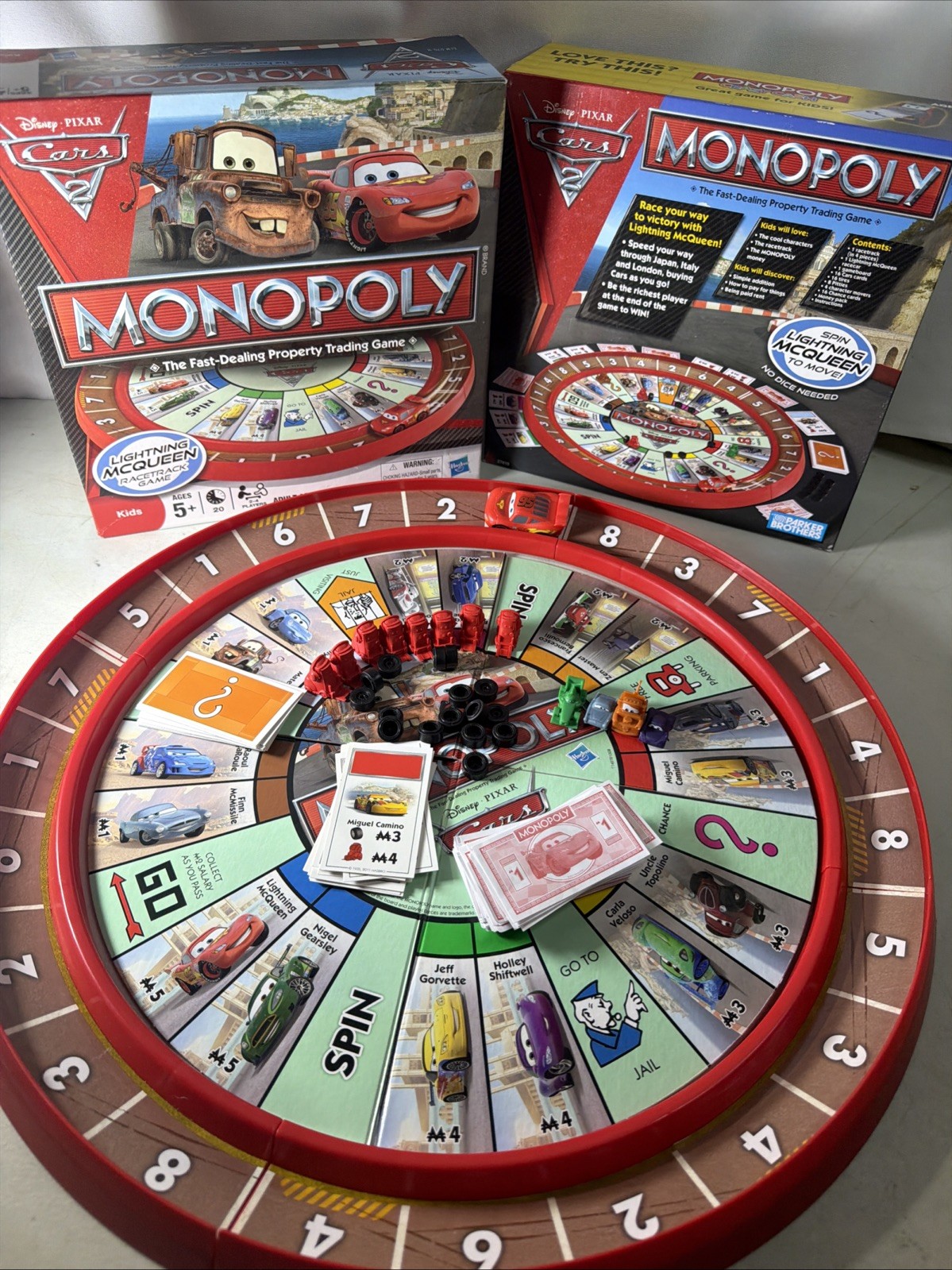 Disney Pixar Cars 2 Monopoly Game Lightning McQueen Racetrack Game COMPLETE