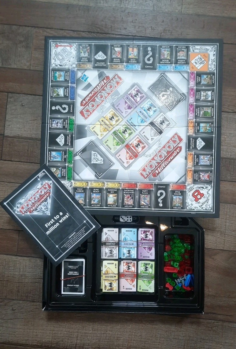 Monopoly Millionaire Edition Board Game – First to a Million Wins, Luxury Theme