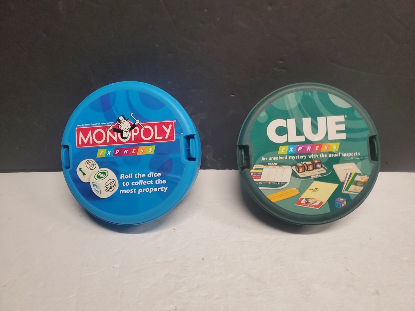 (2) EXPRESS Games: TRAVEL Monopoly & Clue OPEN BOX