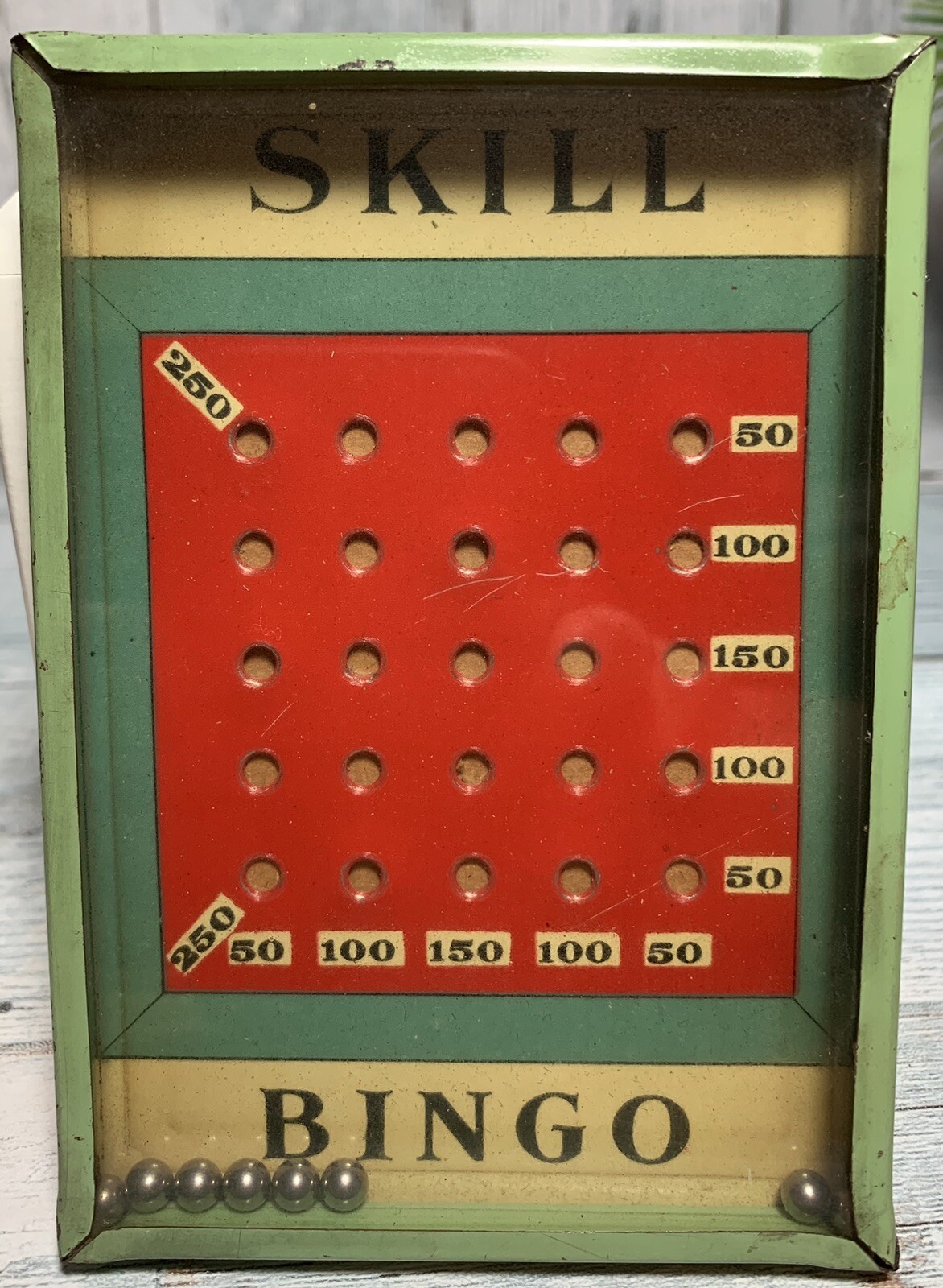 Early 1900’s Dexterity Tin Skill Bingo Game
