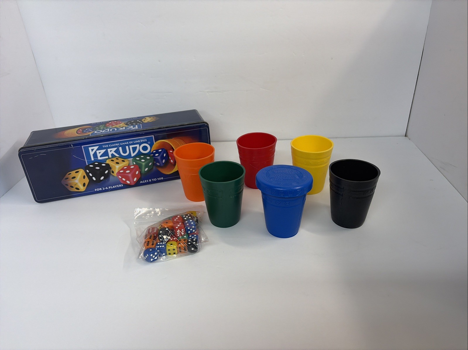 PERUDO Liar’s Dice Game 2002 Tin – South American Dice Game 100% Complete
