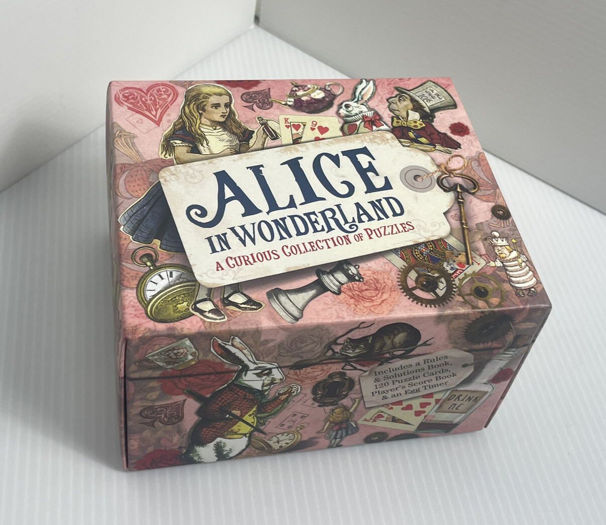 Sterling Innovation Alice in Wonderland Collection of Puzzles Trivia Game Open