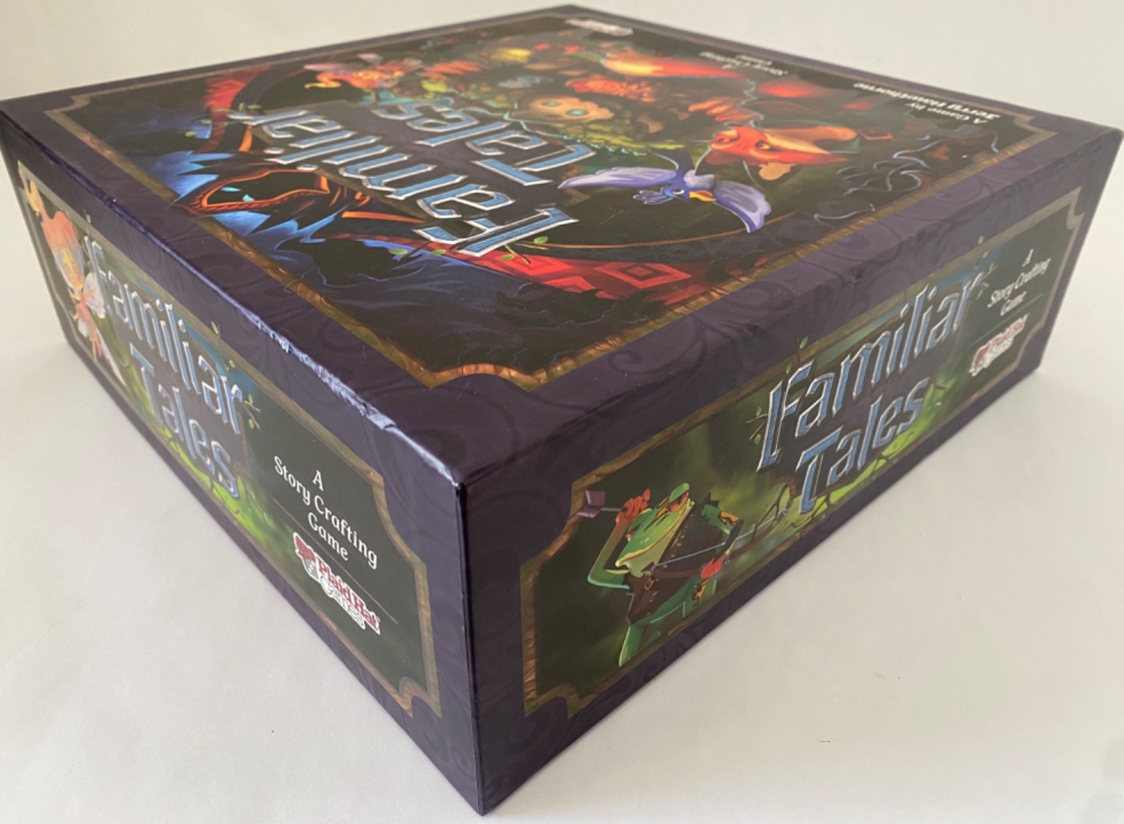 FAMILIAR TALES PLAID HAT BOARD GAME WITH FORAGERS MARKET SUPPLY TRAY