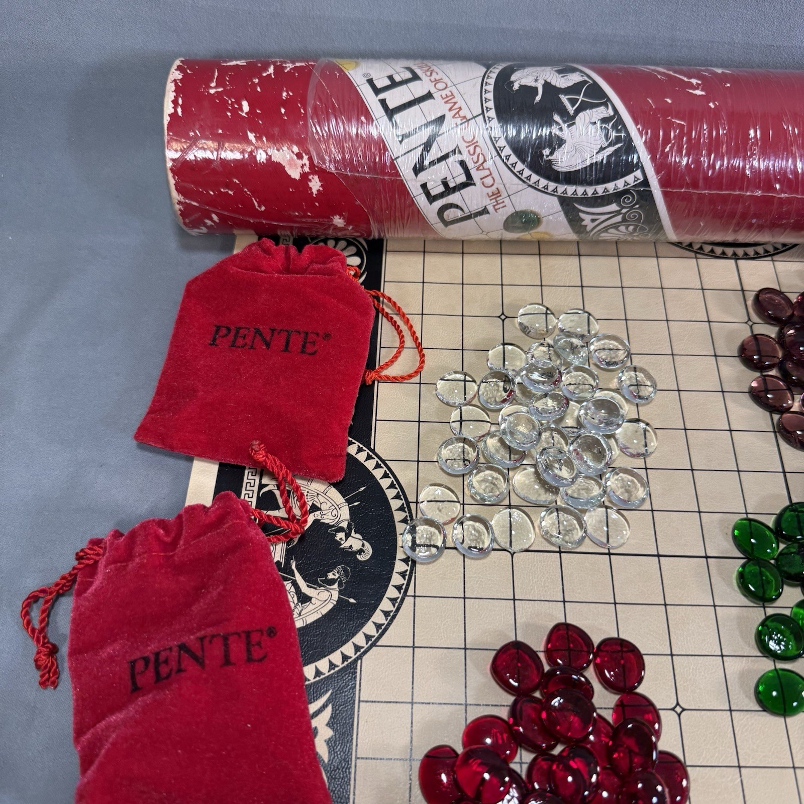 1987 Vintage Red Tube PENTE Game Yellow Green Purple Red Cobalt Blue Clear Stone