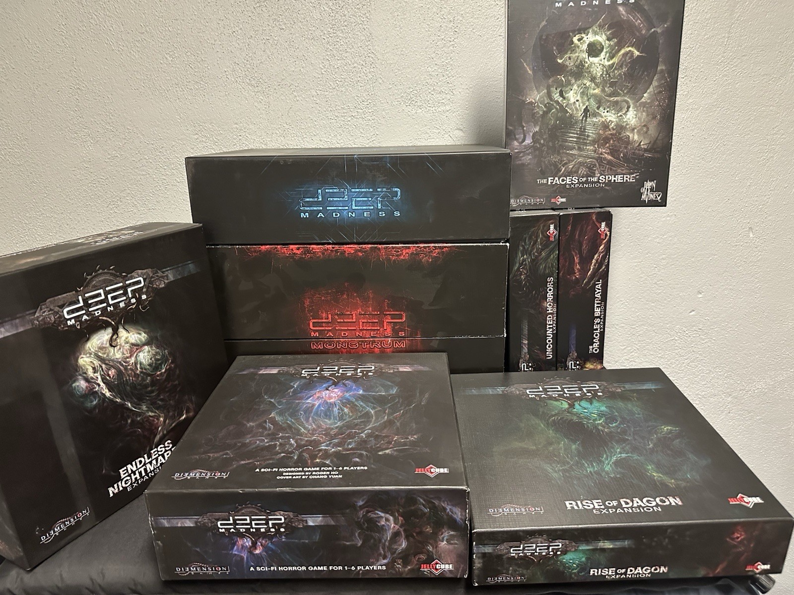 Deep Madness, 5 expansions, Profundum and Monstrum boxes, acrylic packs.