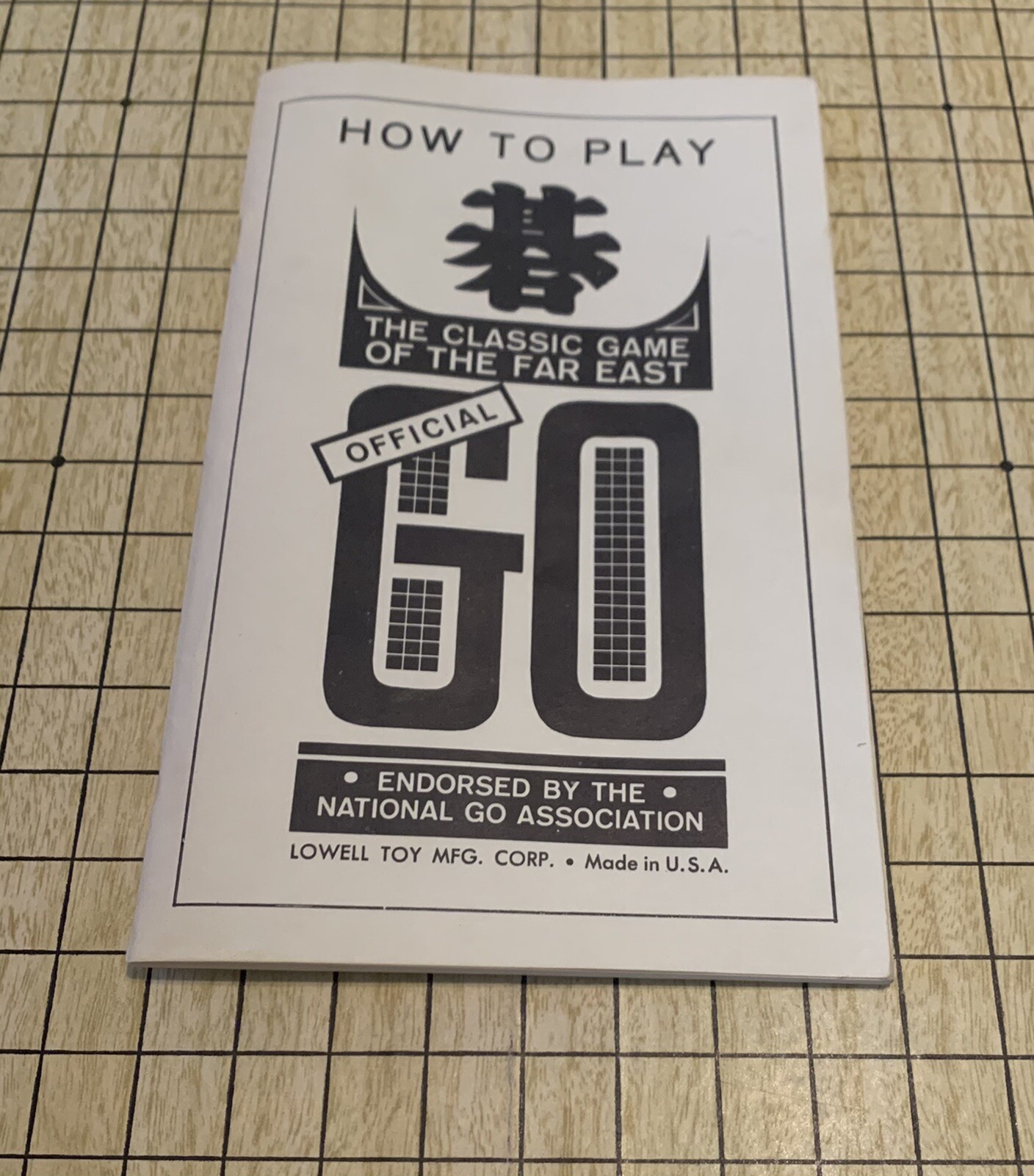 Official Go Classic Game, in fair condition, Lowell Toy Mfg Corp.