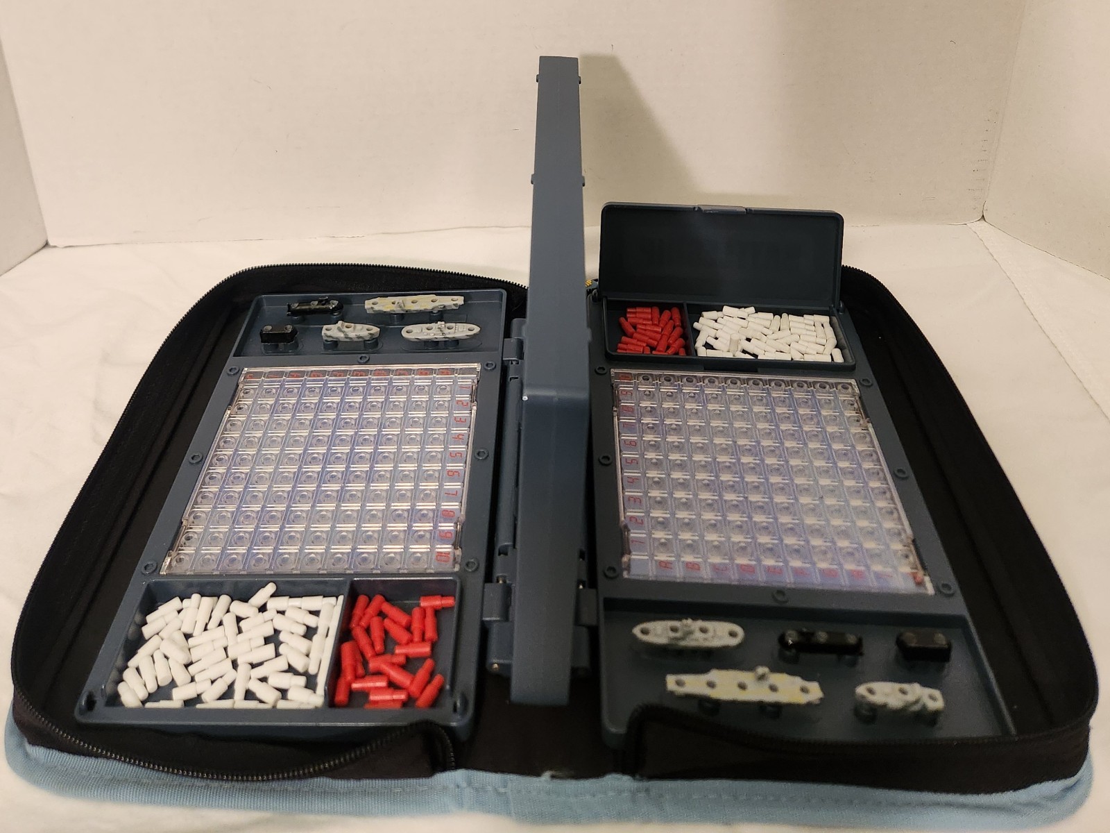 TRAVEL SIZE GAMES BATTLESHIP & DIMINO’S both compleat & in TRAVEL CASES