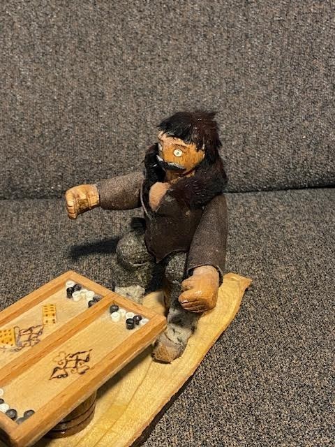 Handmade folk art wooden carved men playing backgammon vintage