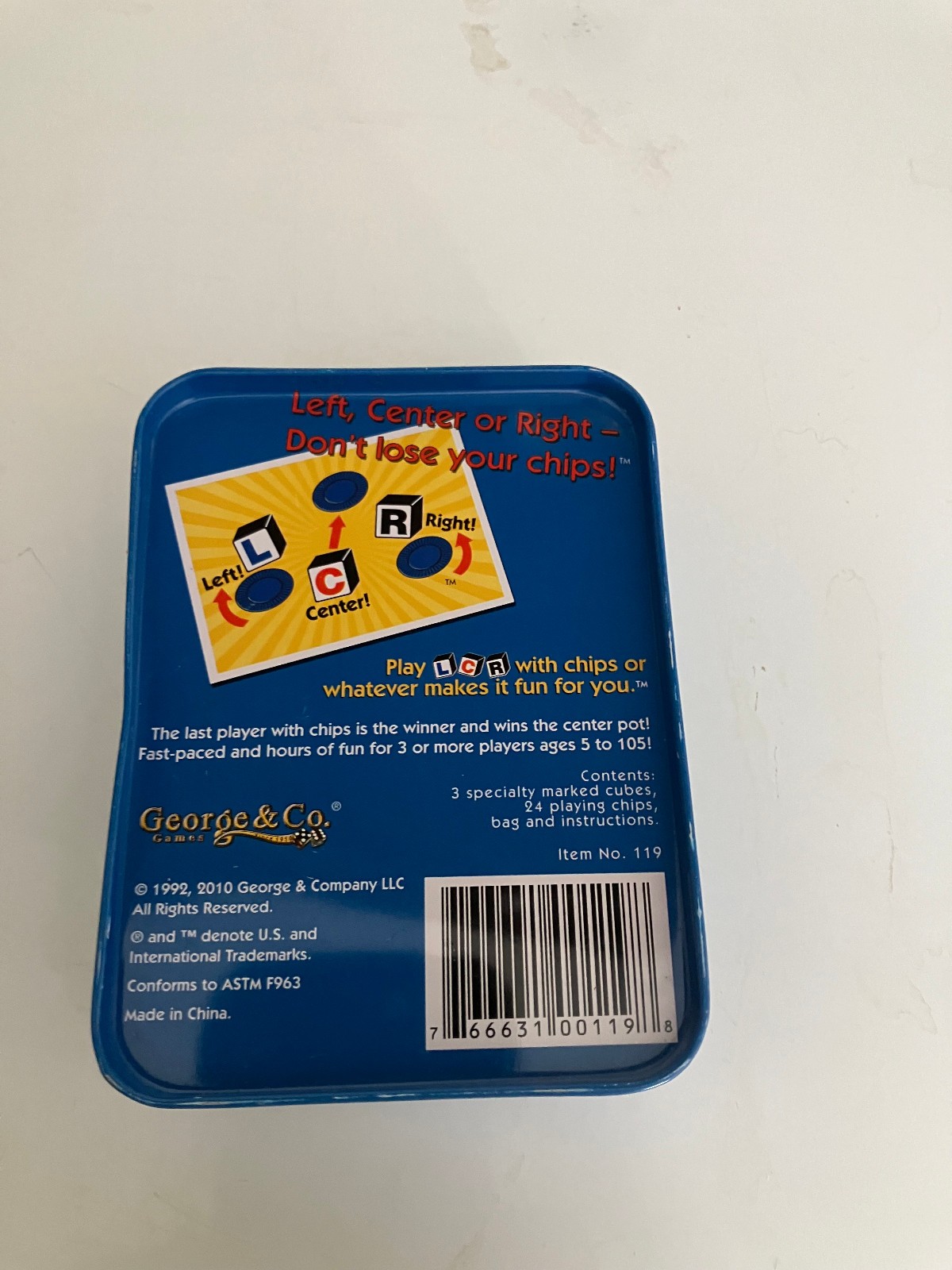 LCR® Left Center Right™ Dice Game – Blue Tin