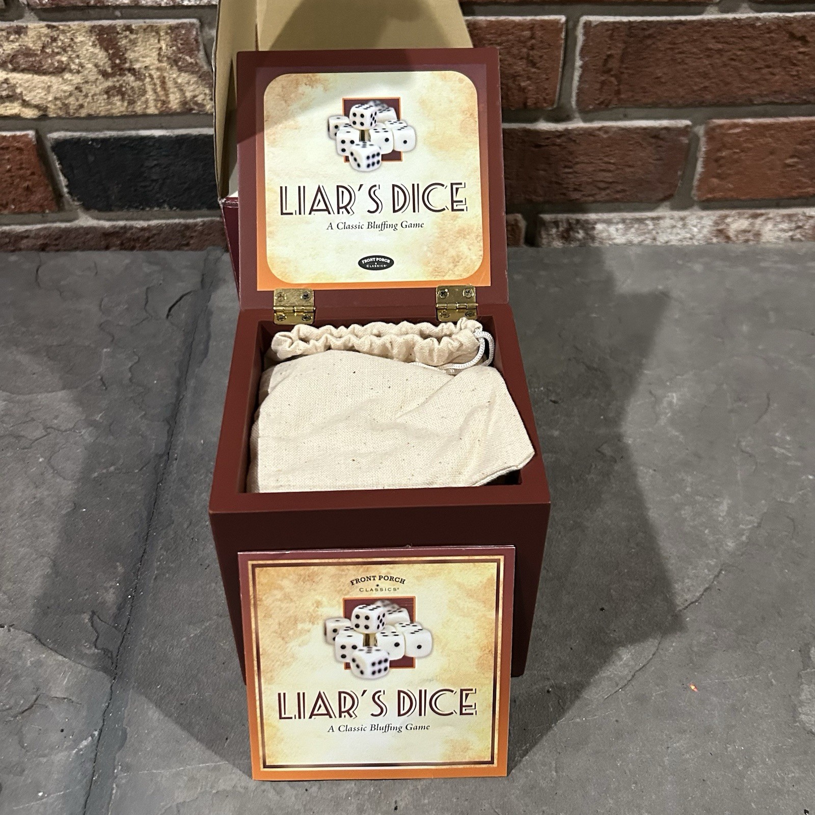 Front Porch Classics Liar’s Dice A Classic Bluffing Game set in storage case – B