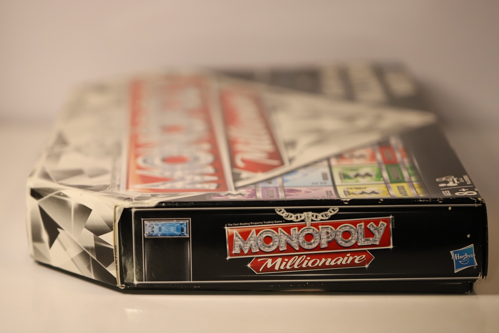 Monopoly: Millionaire Edition Board Game – First to a Million Wins Luxury Theme