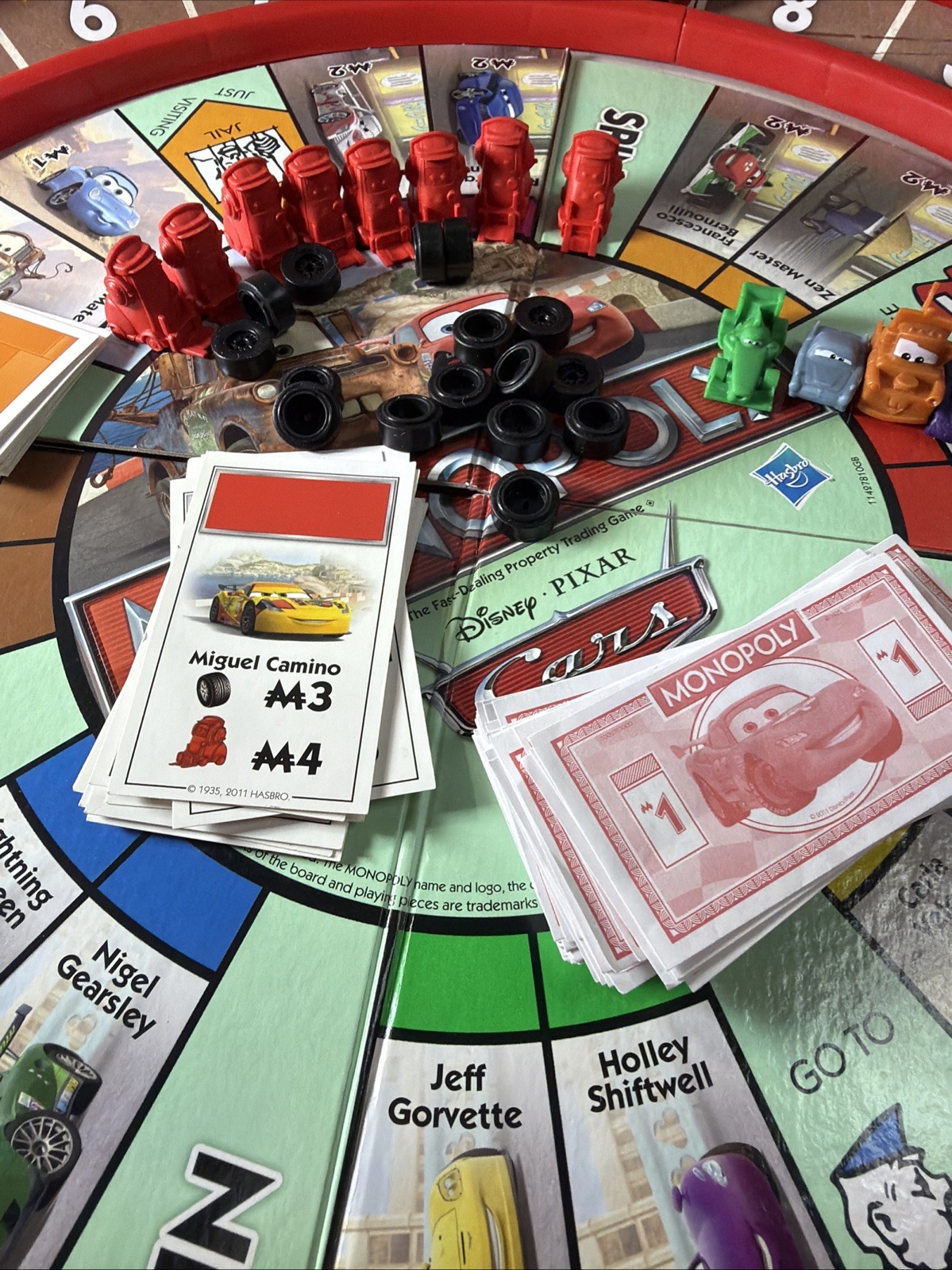Disney Pixar Cars 2 Monopoly Game Lightning McQueen Racetrack Game COMPLETE