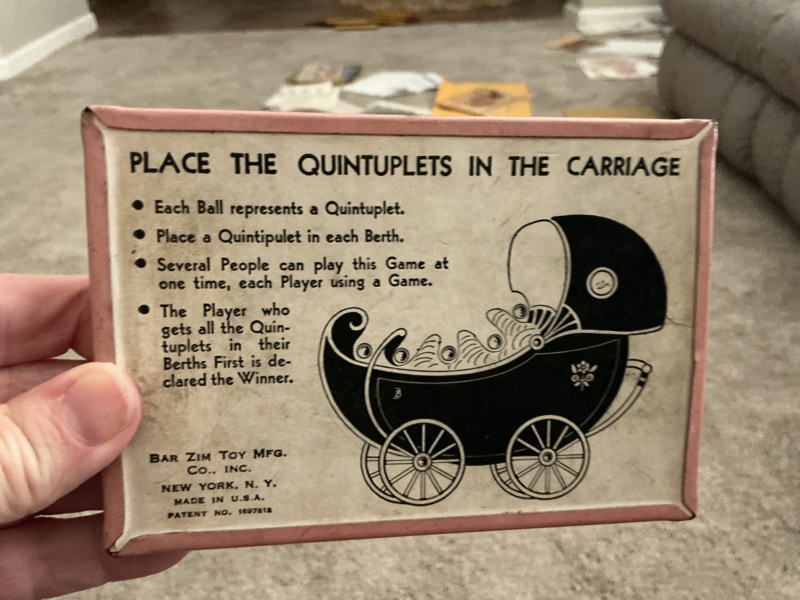 2-1930s handheld dexterity games Dionne Quintuplets baby carriage Bar Zim 1930’s