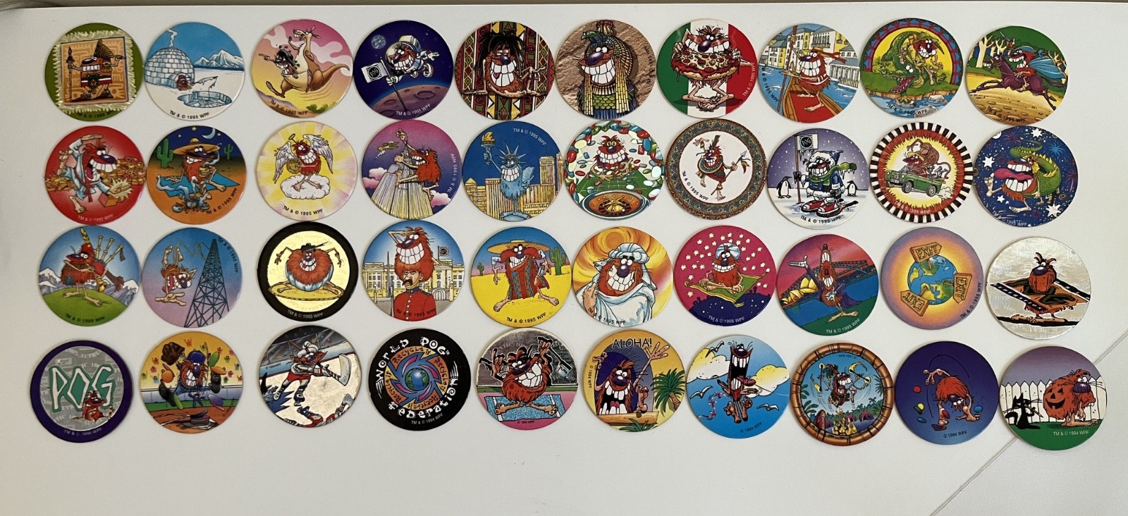Lot of 40 Pogs, 2 Slammers, Tube, Authentic World Pog Federation all different