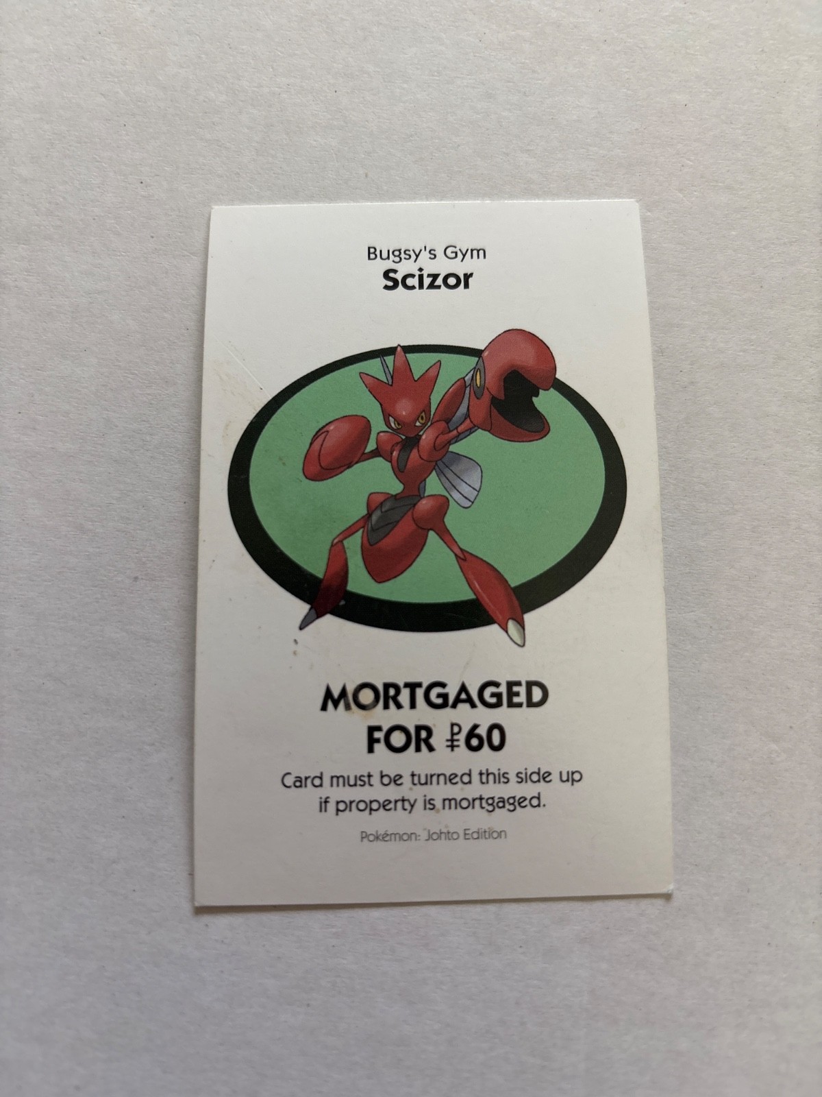 2016 Monopoly Pokémon Title Deed Card Game Piece Light Blue Bugsy Gym Scizor
