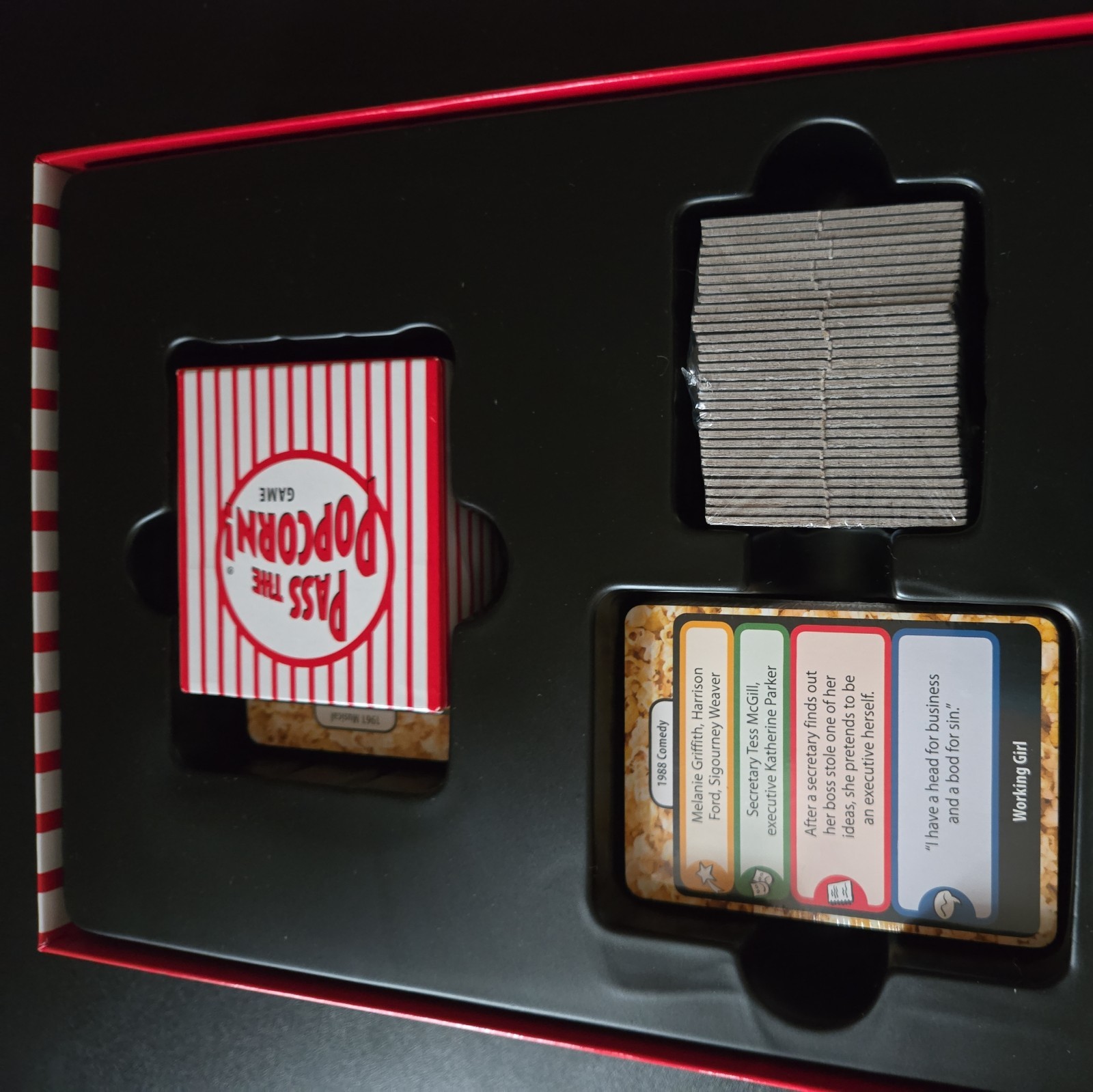 Pass the Popcorn Trivia game. New and complete . Open box.