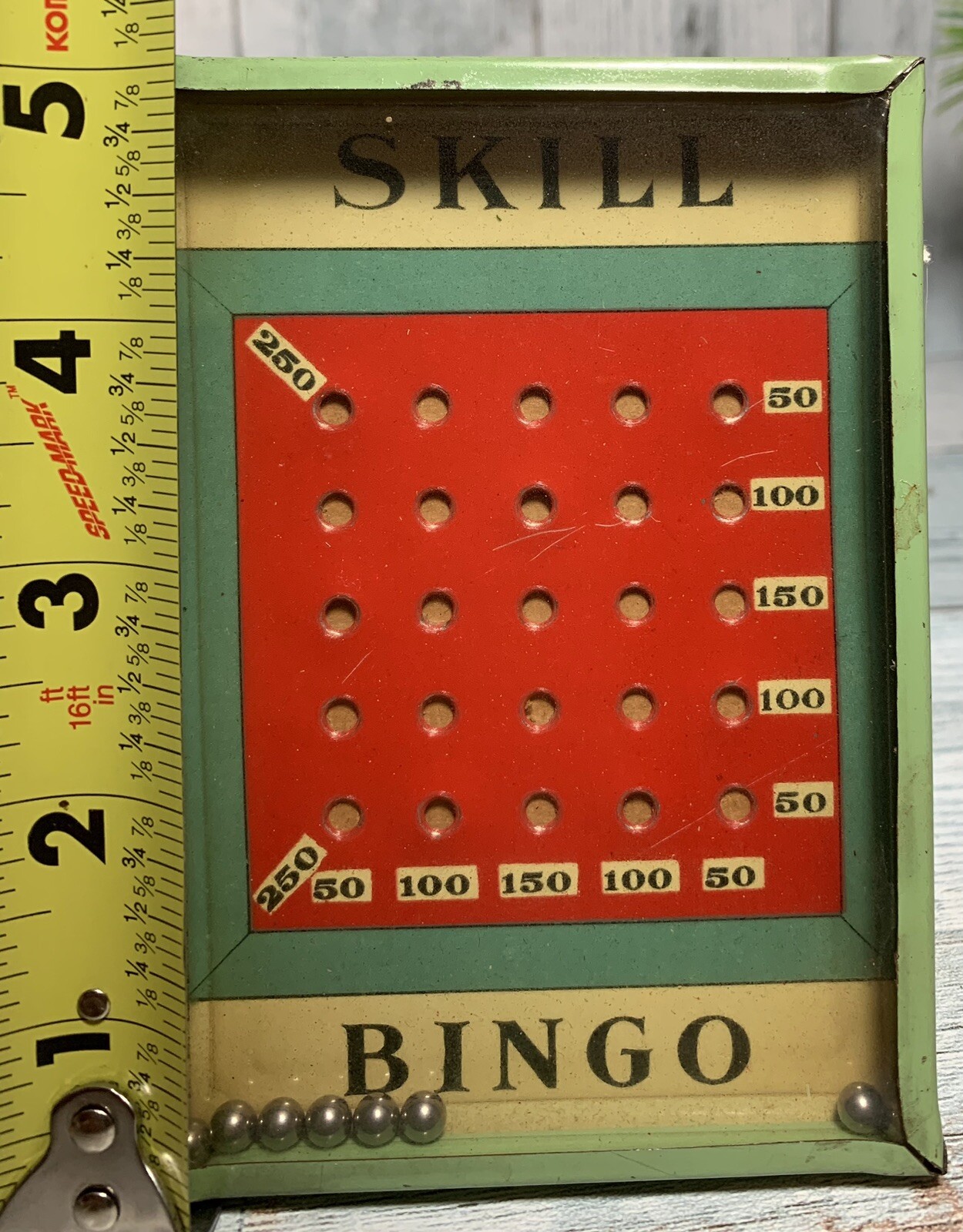 Early 1900’s Dexterity Tin Skill Bingo Game