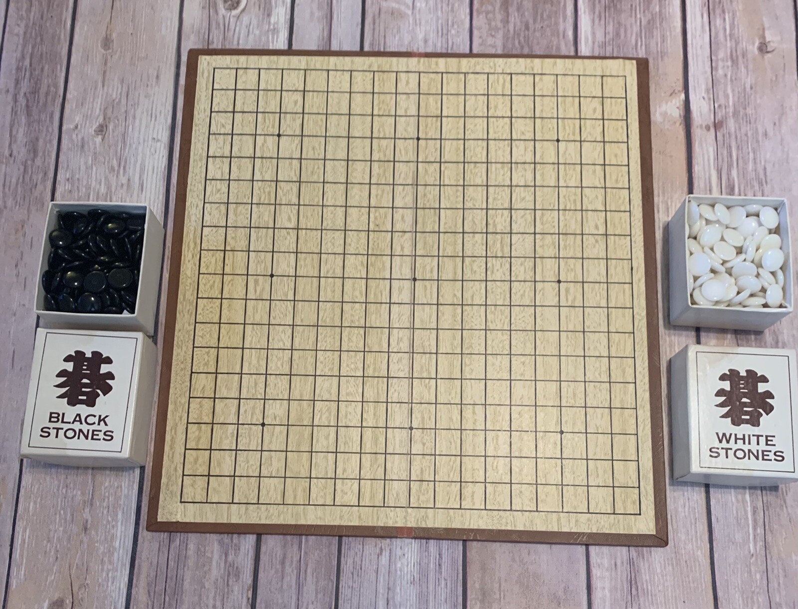Official Go Classic Game, in fair condition, Lowell Toy Mfg Corp.