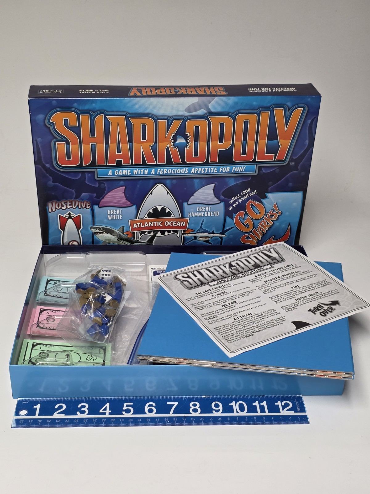 SHARKOPOLY, COMPLETE GAME FEROCIOUS APPETITE FOR FUN.