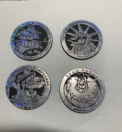 4 Metallic Silver colored vintage pogs from The World Pog Federation 1995