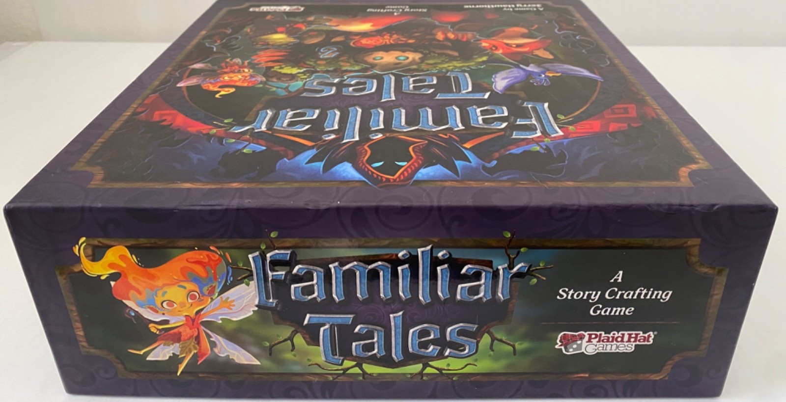 FAMILIAR TALES PLAID HAT BOARD GAME WITH FORAGERS MARKET SUPPLY TRAY