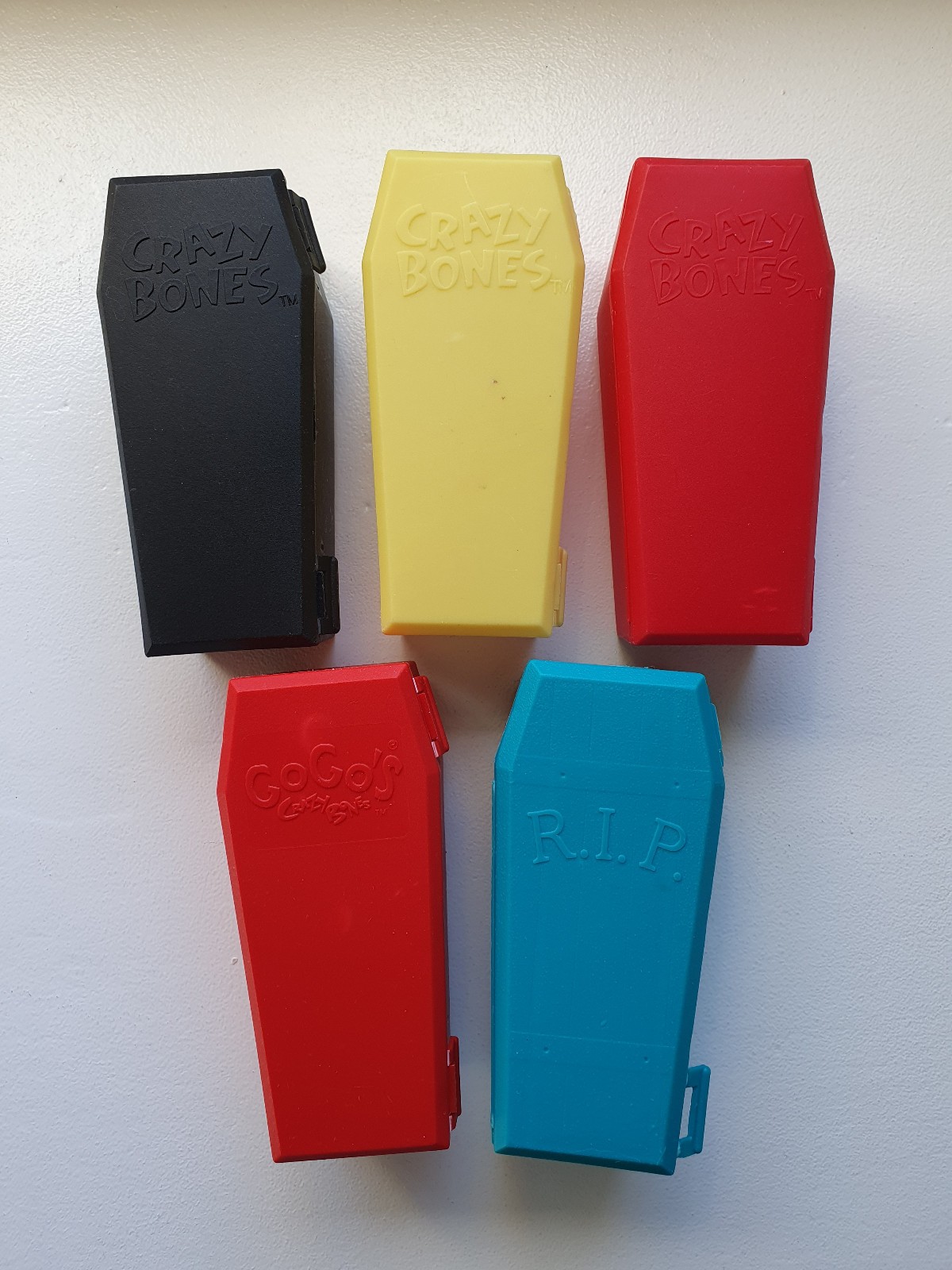 Coffins in various colours & text – Gogo’s Crazy Bones