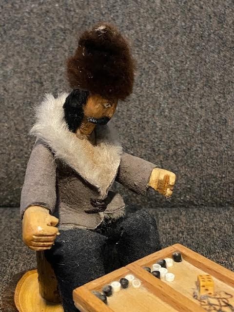 Handmade folk art wooden carved men playing backgammon vintage