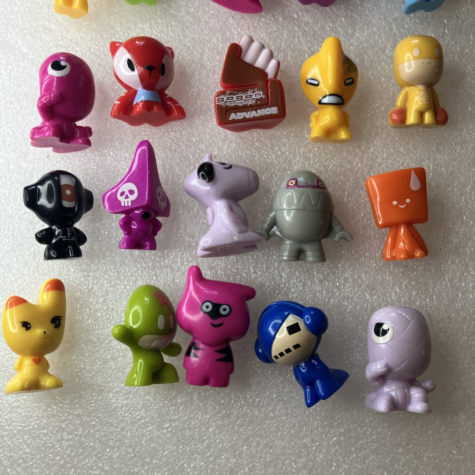 Lot of 25 Gogos Crazy Bones Figures As Shown