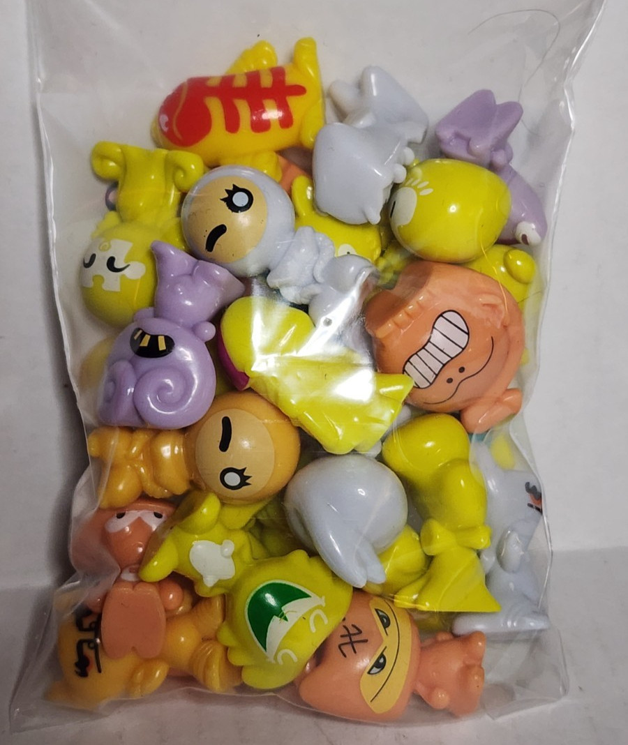 Gogo Crazy Bones Lot of 30: Yellow and Tan tone, Random