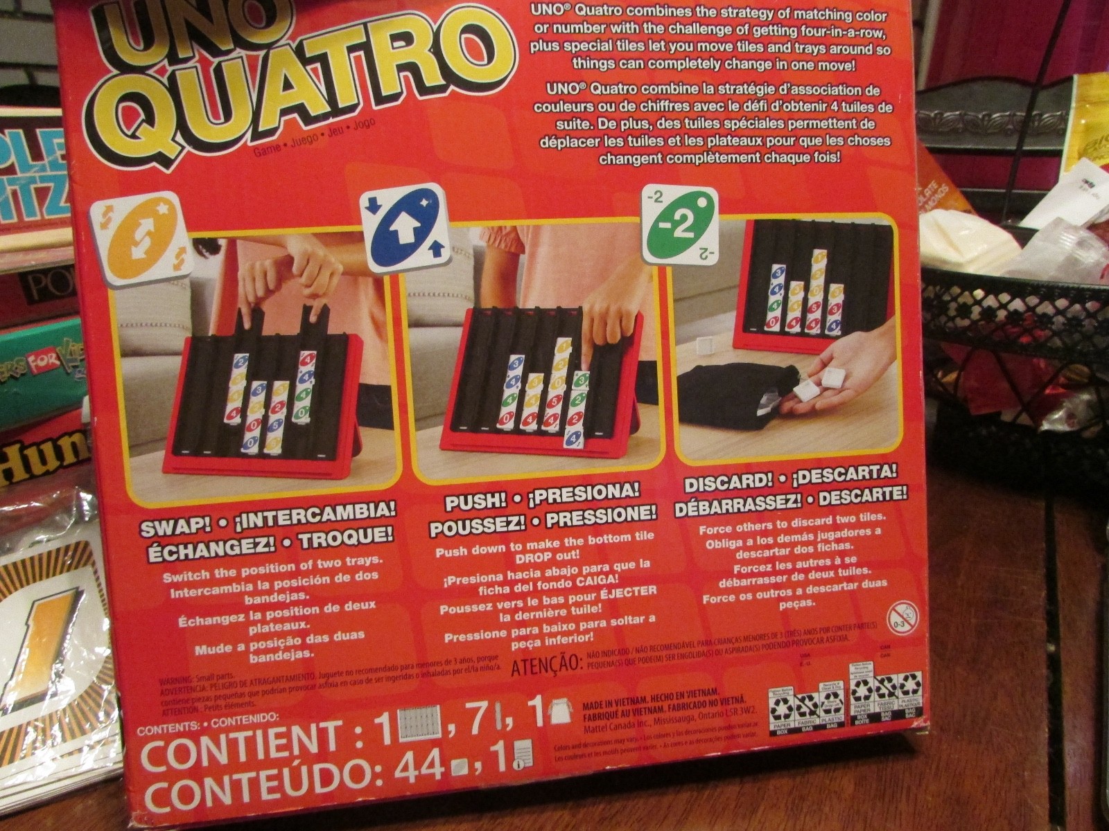 Mattel Games UNO Quatro Game with Colored Tiles & Plastic Grid for Family
