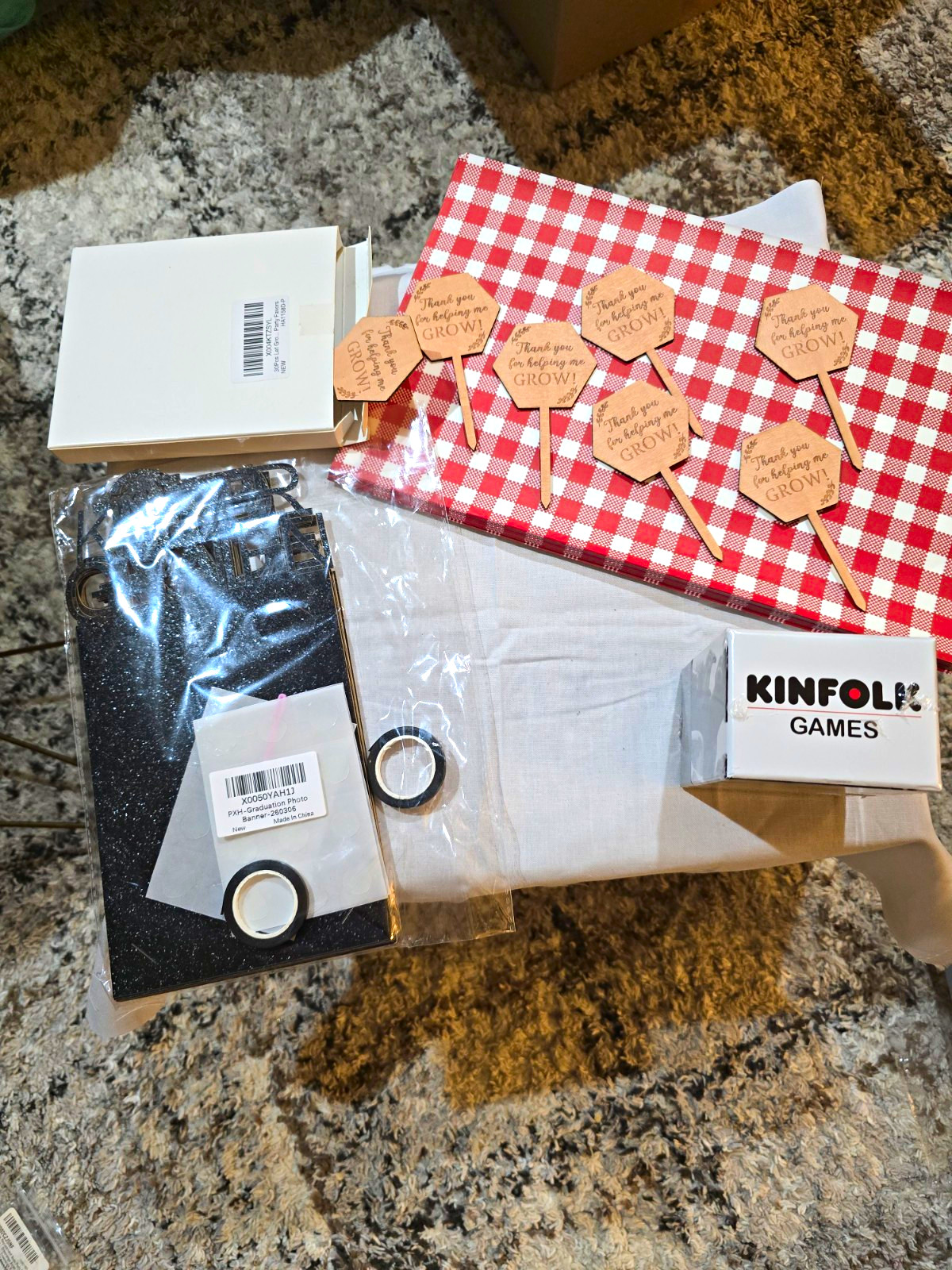 Graduation booth props and paper placemats and parted favors and Culture Cues