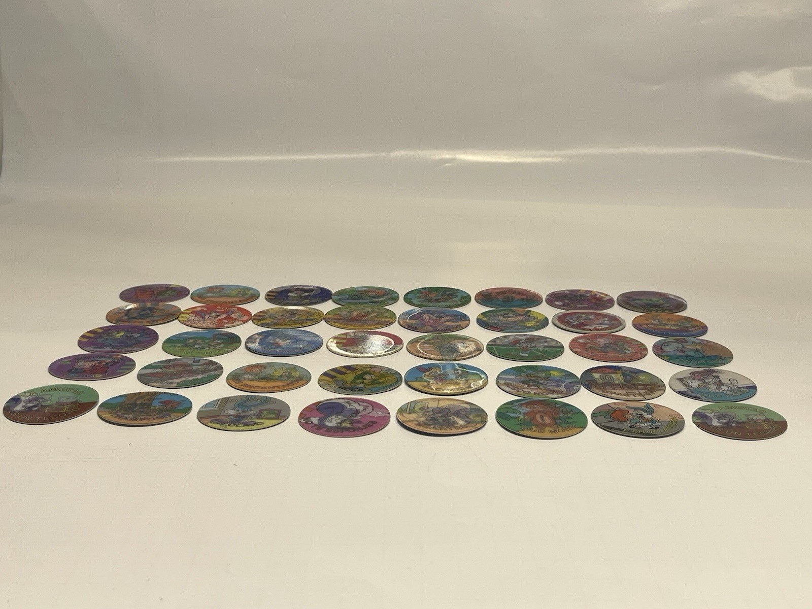 Vintage Set Of “40” LOONEY TUNES HOLOGRAPHIC TAZOS (POGS) /SABRITAS MEXICO 1994