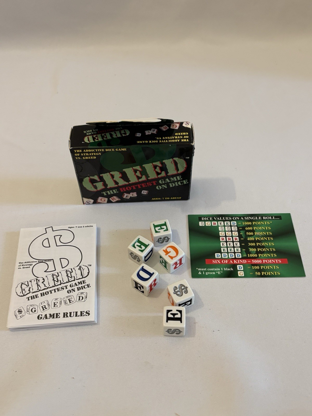 Greed-the hottest game on dice by TDC Games. Complete Except Pencil. Dice Game