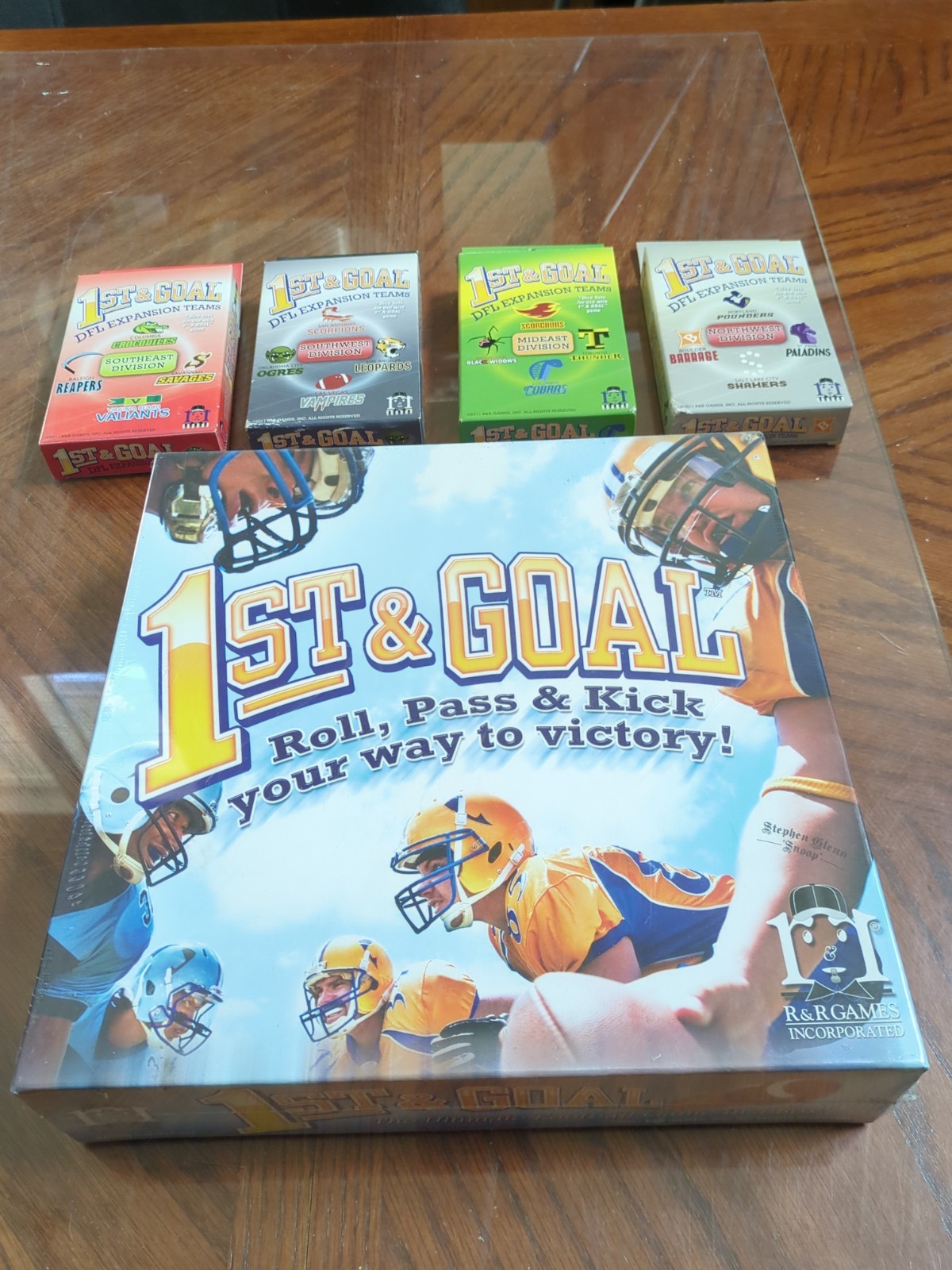 1st & Goal + 4 expansions (12 teams). SEALED UNOPENED NEW