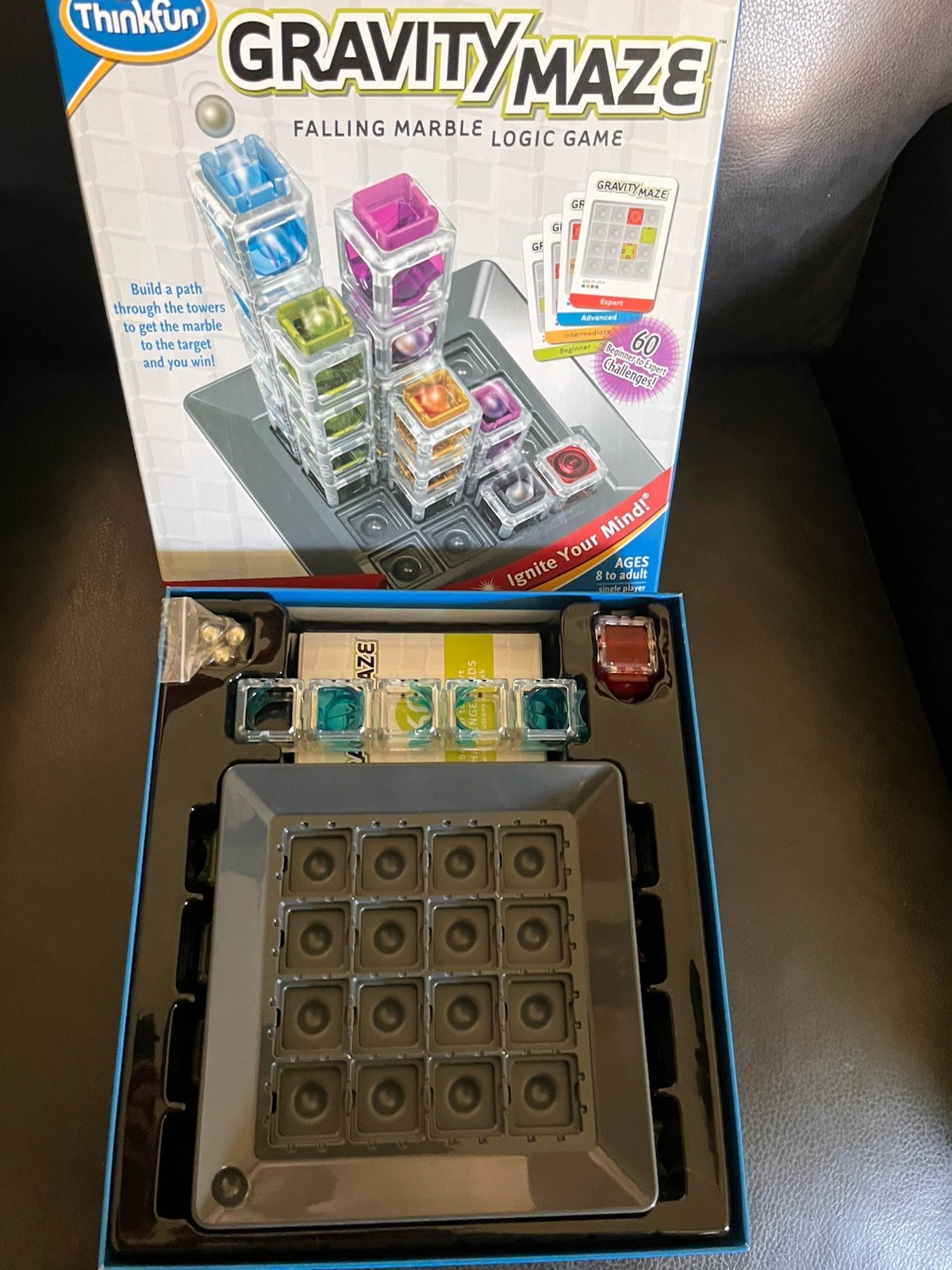 THINK FUN GRAVITY MAZE GAME FALLING MARBLE AGES 8 TO ADULT ignite your mind!