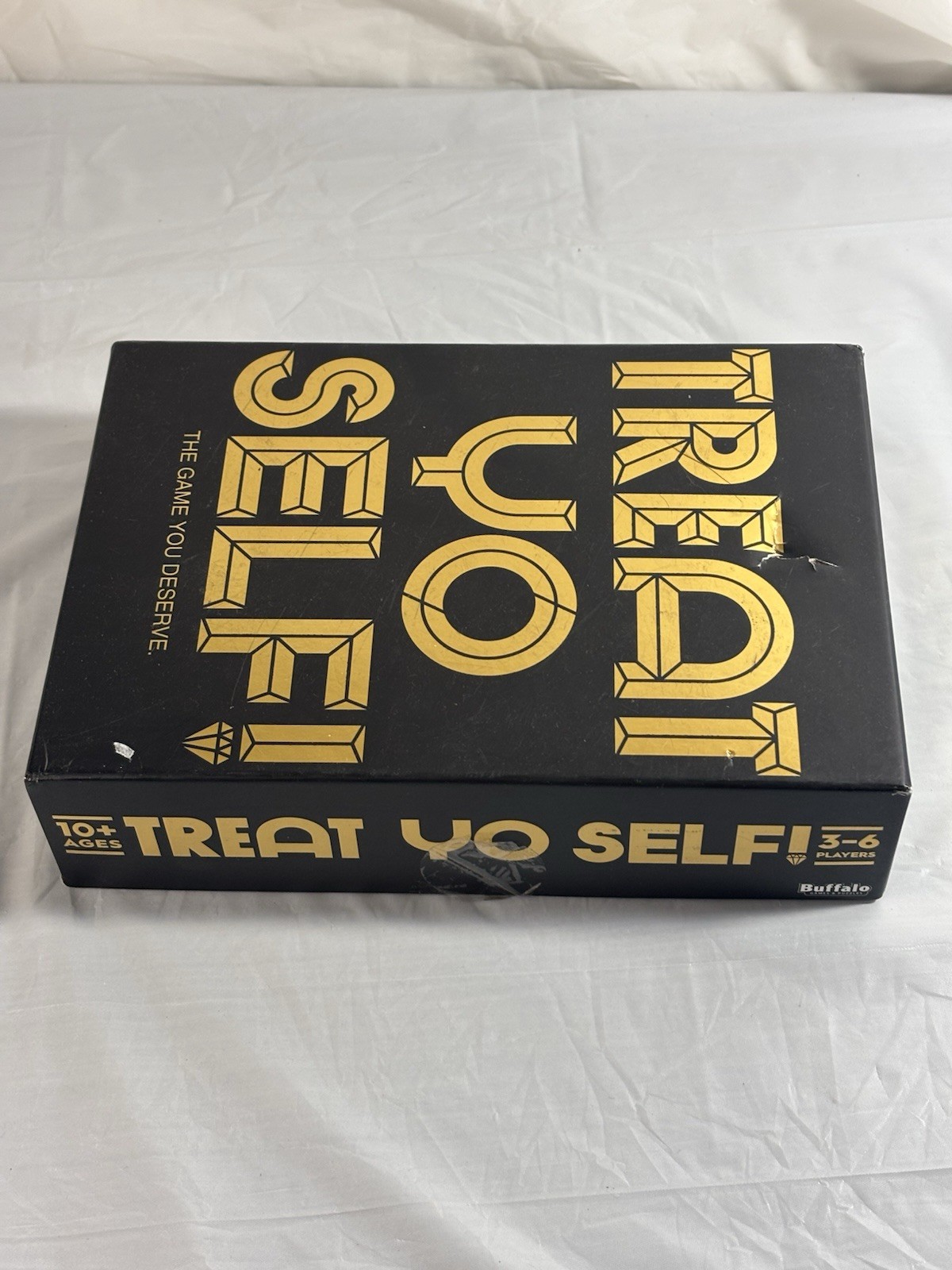 Treat Yo Self! The Game You Deserve. A Bidding and Bluffing Family Strategy Game