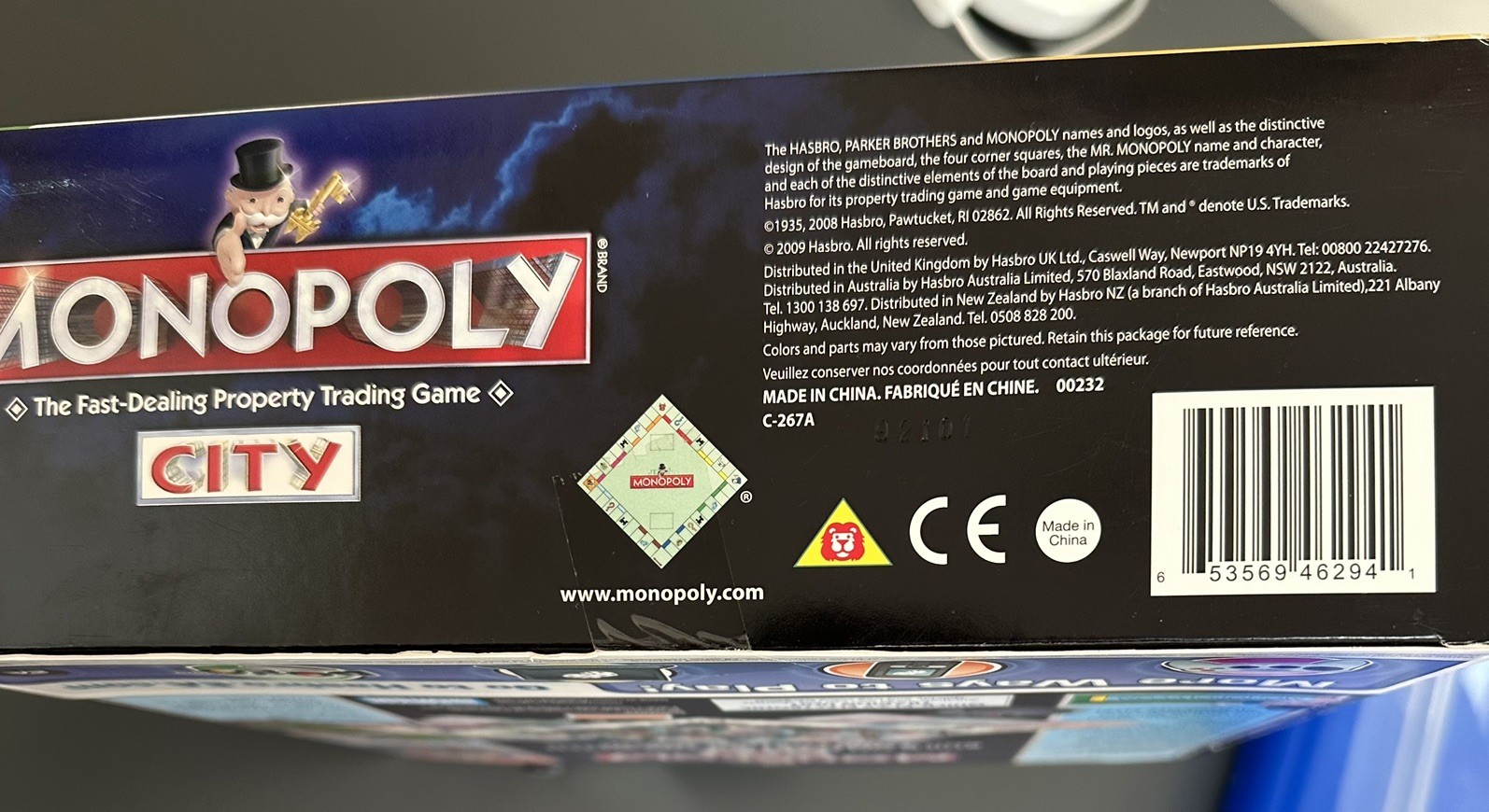 MONOPOLY CITY Metal TIN Box Edition Game 2009 New in Box. Never Played