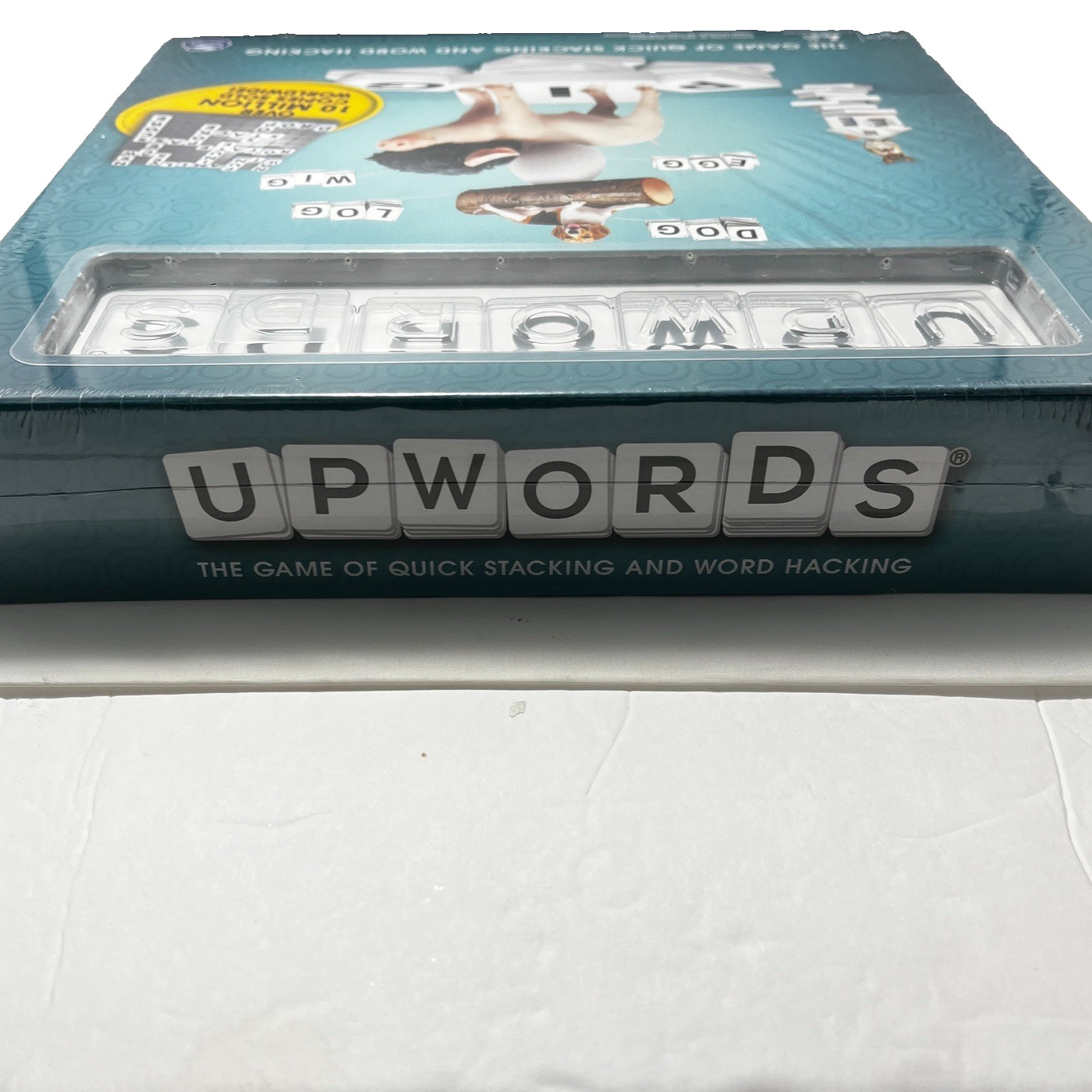 Upwords, The Game of Quick Stacking & Word Hacking with Stackable Letter Tile