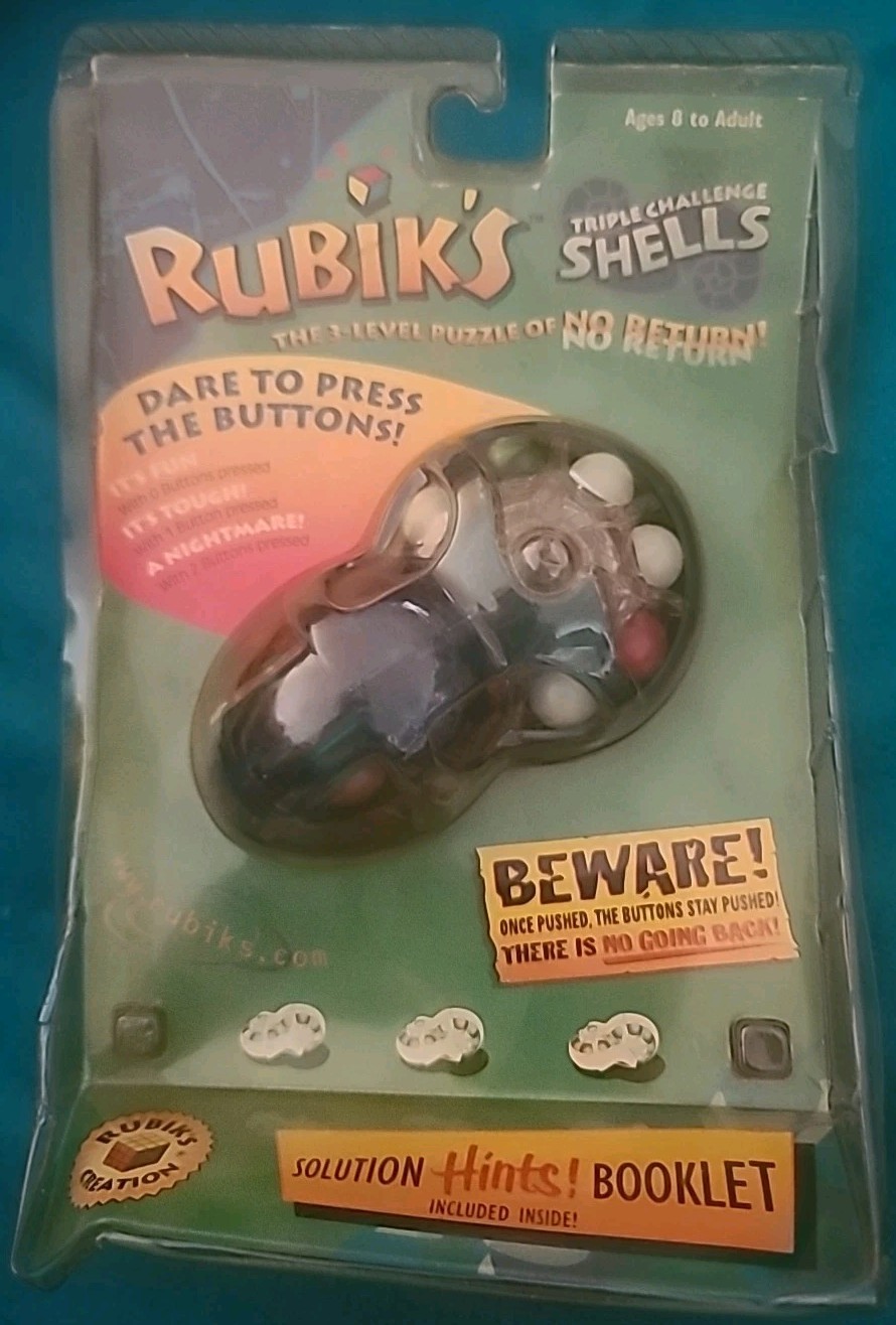 NIP 2000 Hasbro – RUBIKS TRIPLE CHALLENGE SHELLS Hand Held Game – Hard to Find